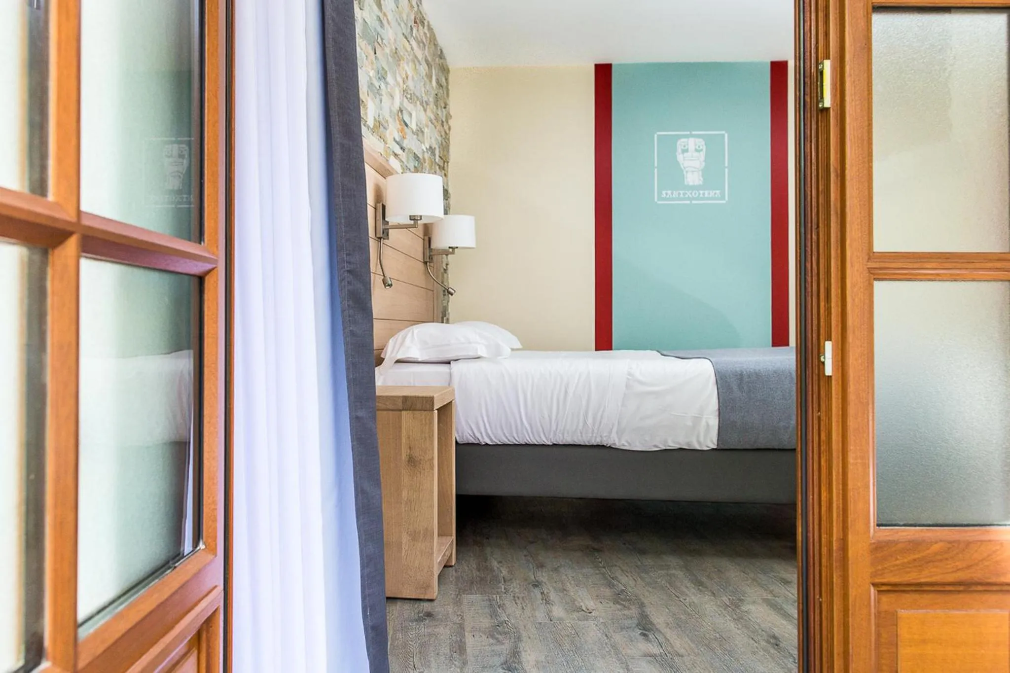 Decorative detail, Bed in Logis Hotel Erreguina