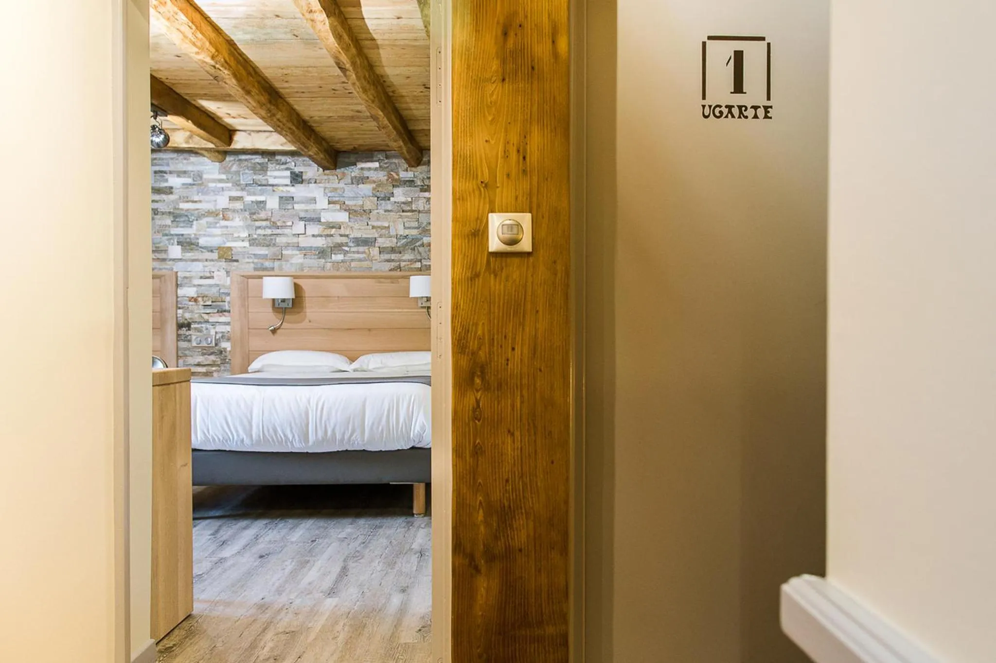 Decorative detail, Bed in Logis Hotel Erreguina