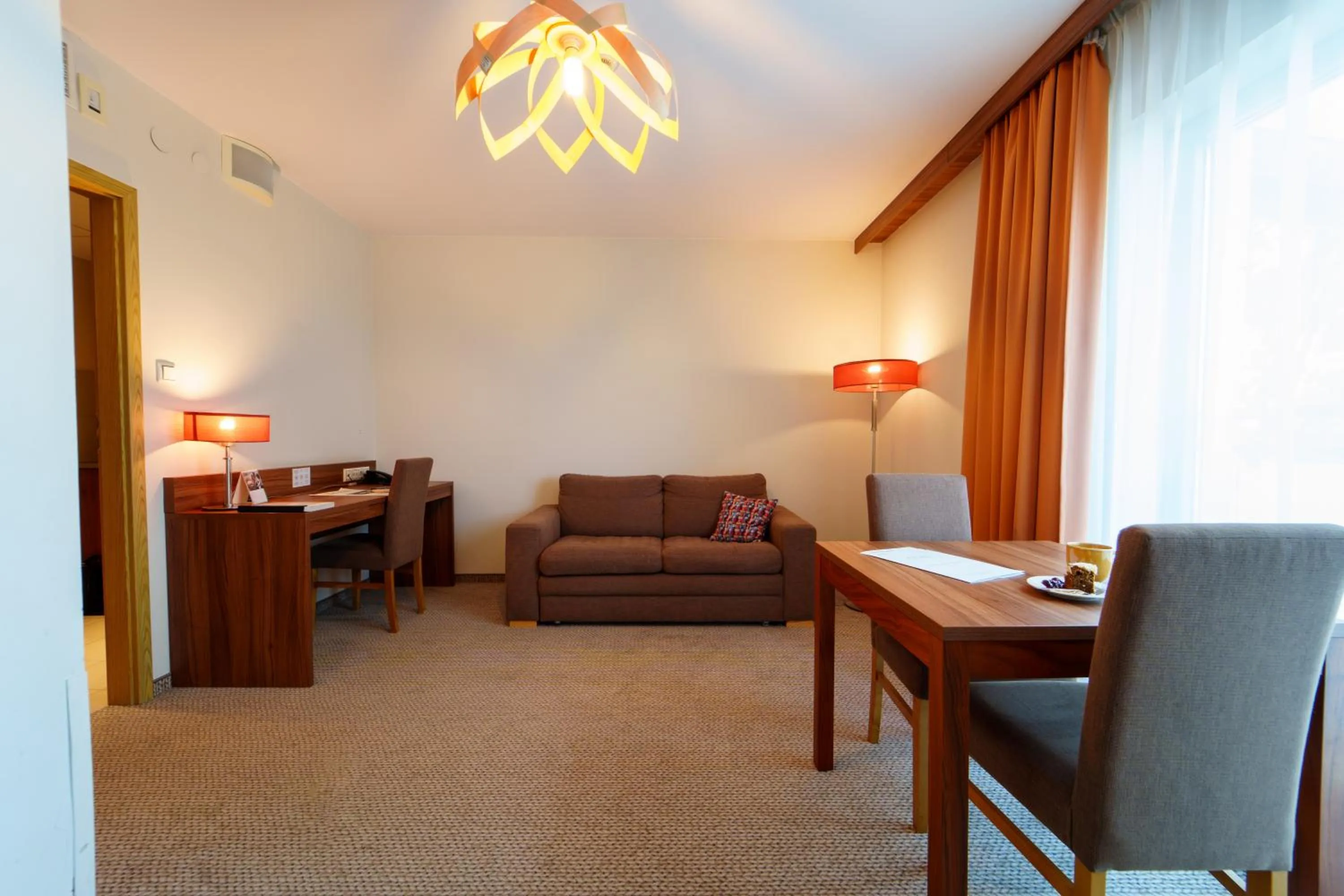 Seating area in Arche Hotel Puławska Residence Warszawa