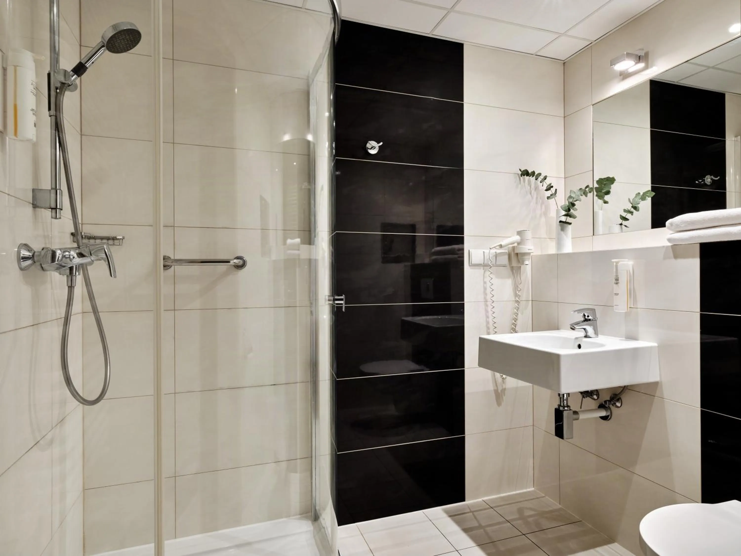Shower in Arche Hotel Puławska Residence Warszawa