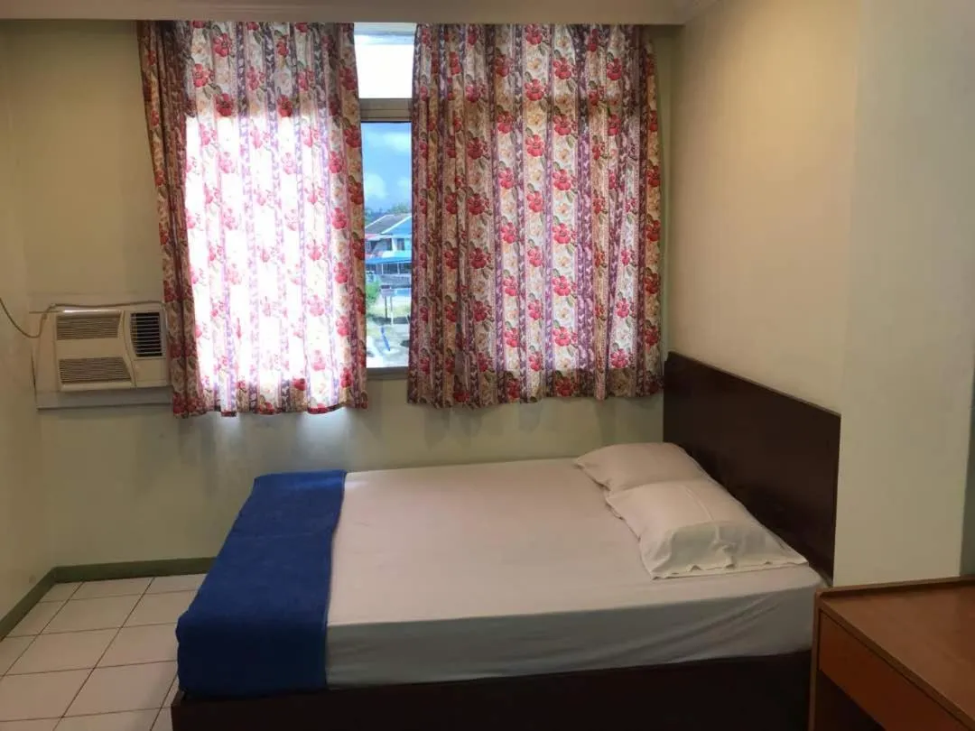 Bed in Sri Gate Hotel