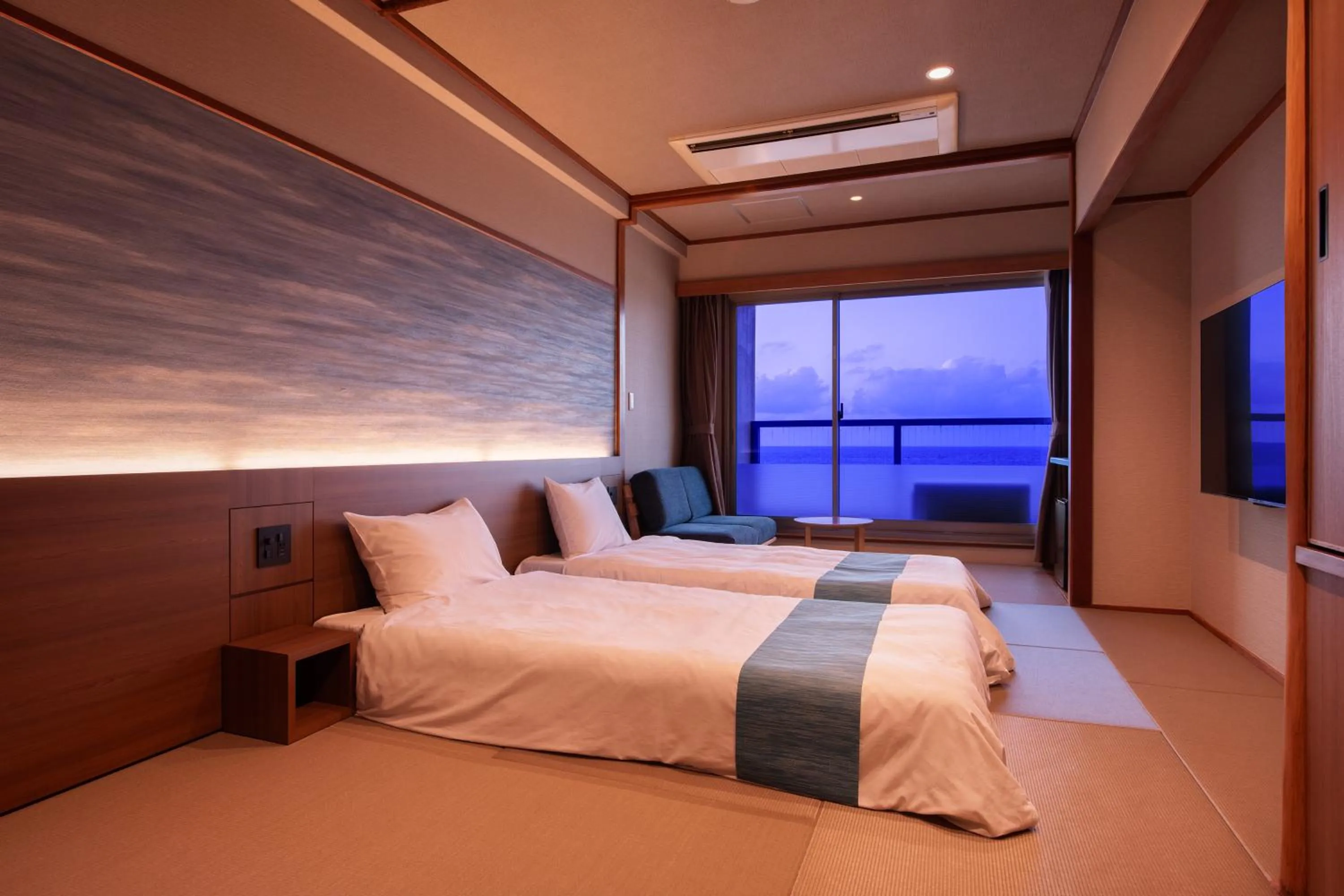 Bed in Kaike Seaside Hotel