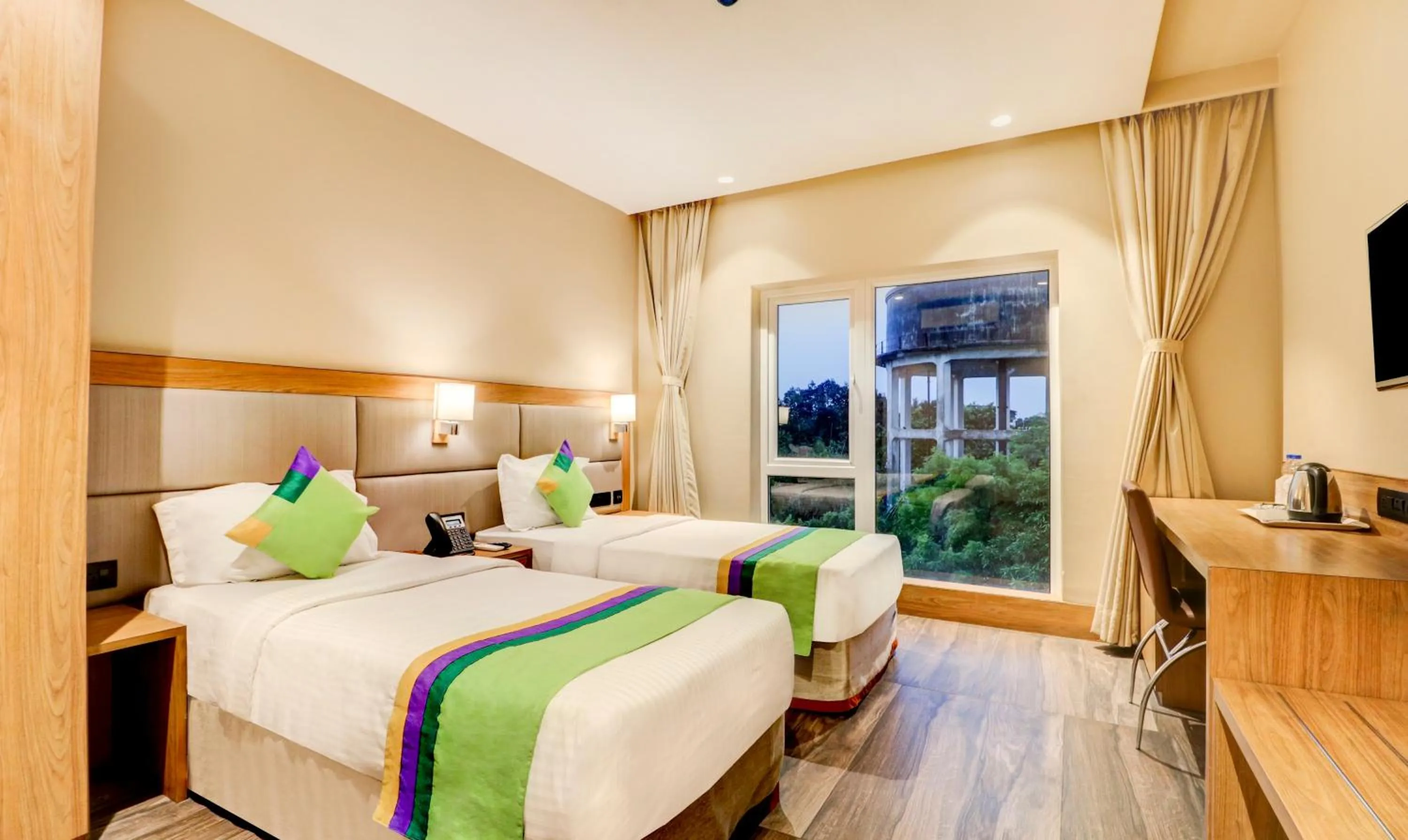 Bedroom, Bed in Treebo Radhe Palace, Lake Town