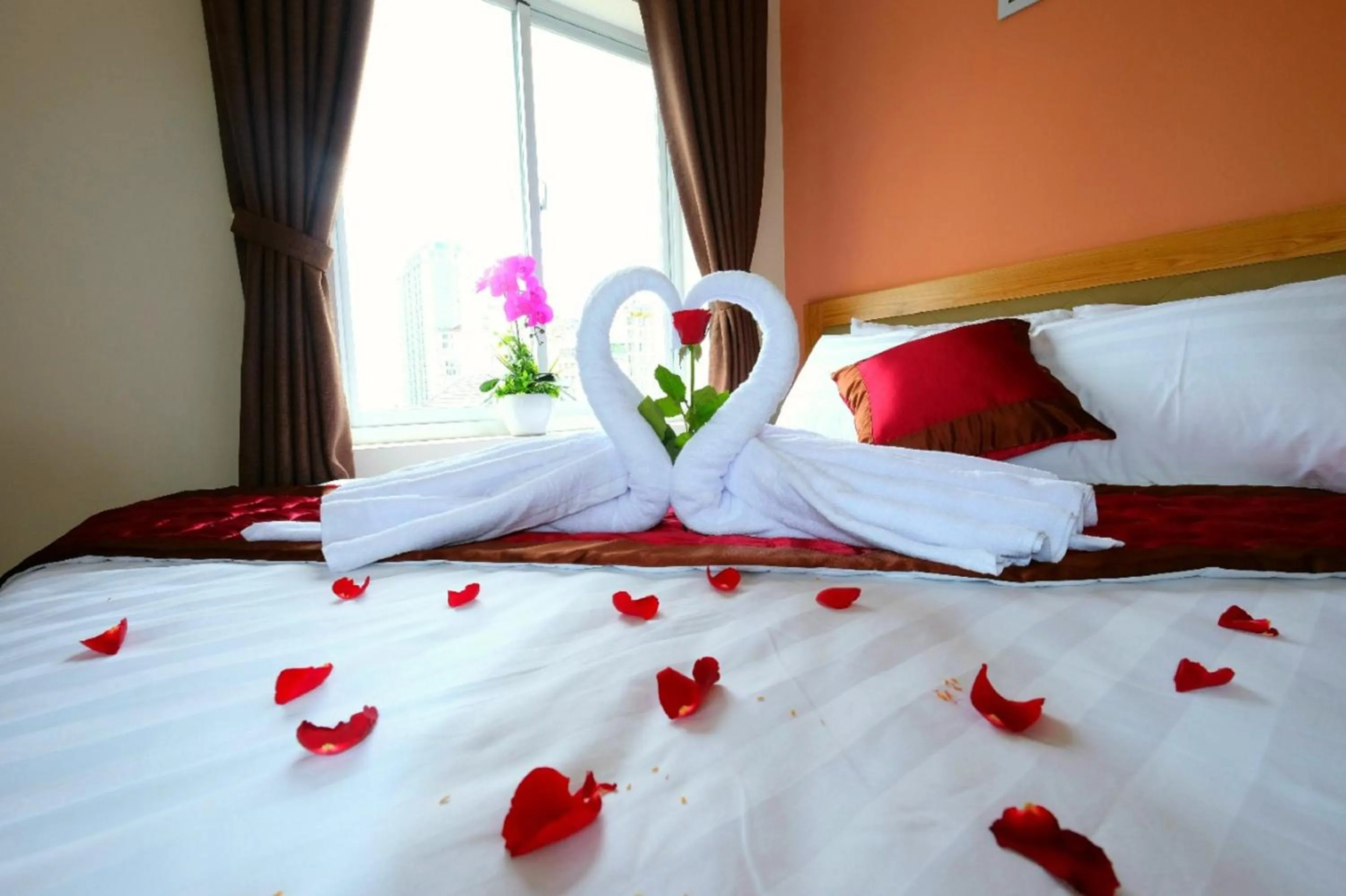 Photo of the whole room, Bed in Marigold Hotel & Apartment