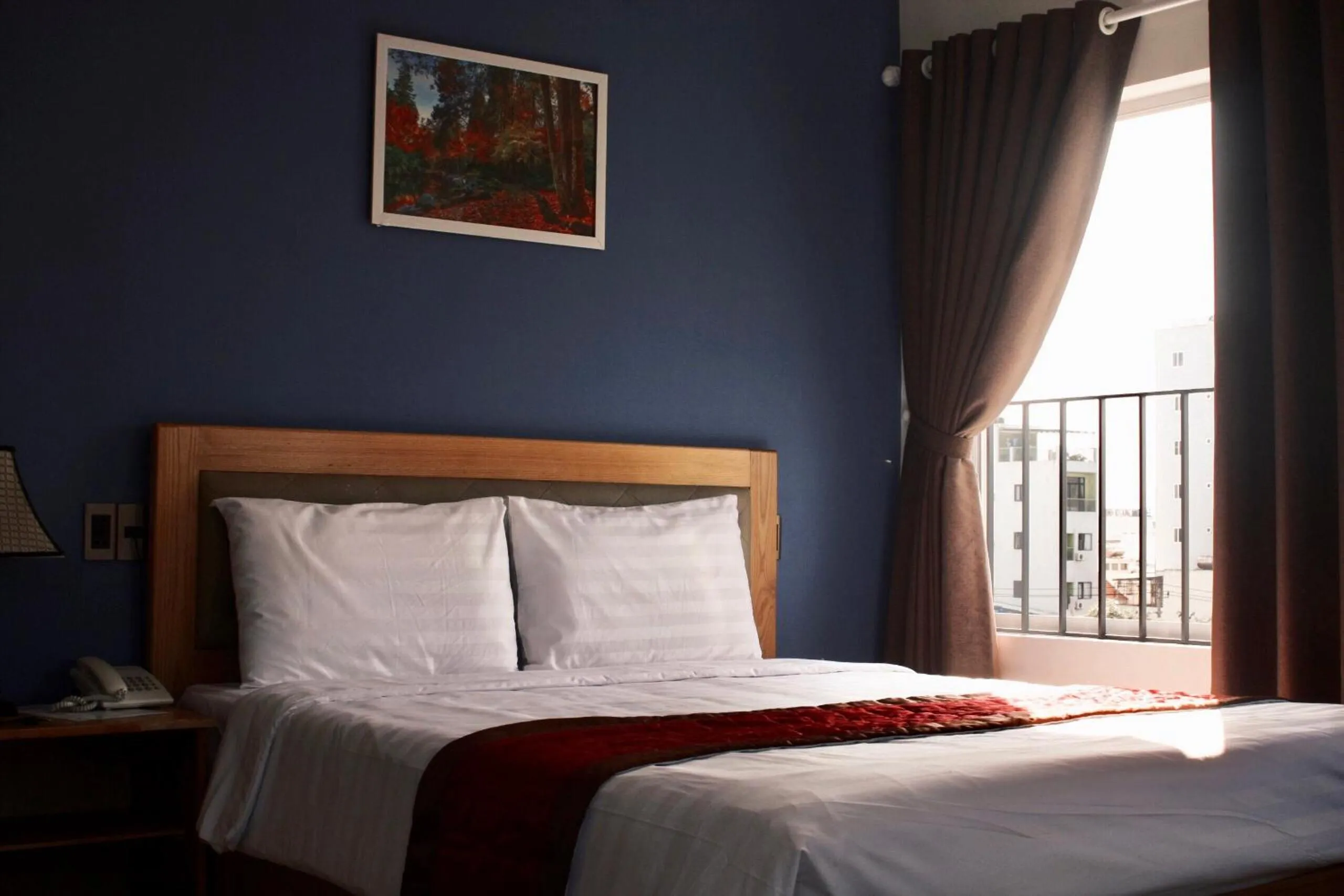 Bed in Marigold Hotel & Apartment