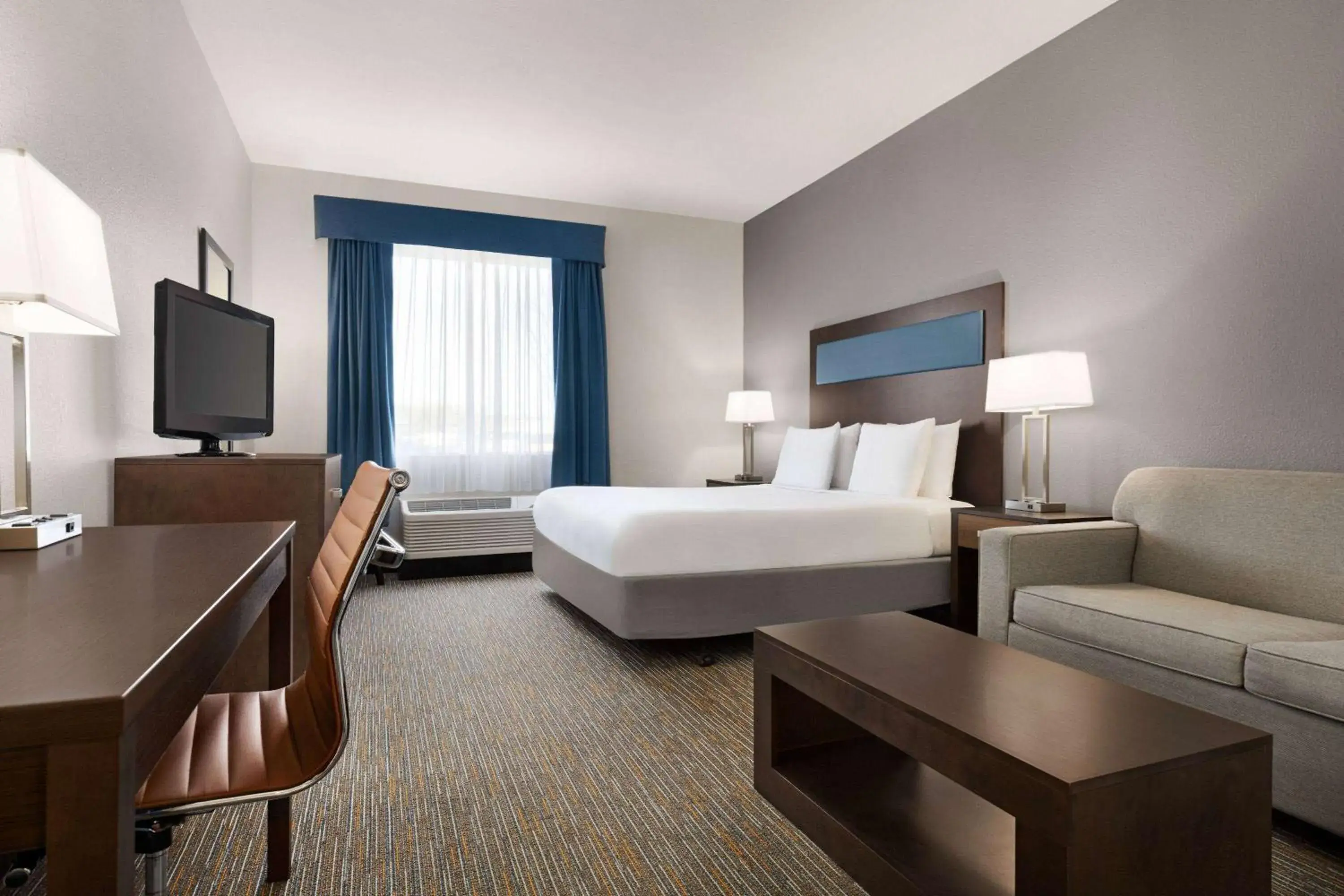 Photo of the whole room, Bed in Wingate By Wyndham Southport Photo of the whole room, Bed in Wingate By Wyndham Southport