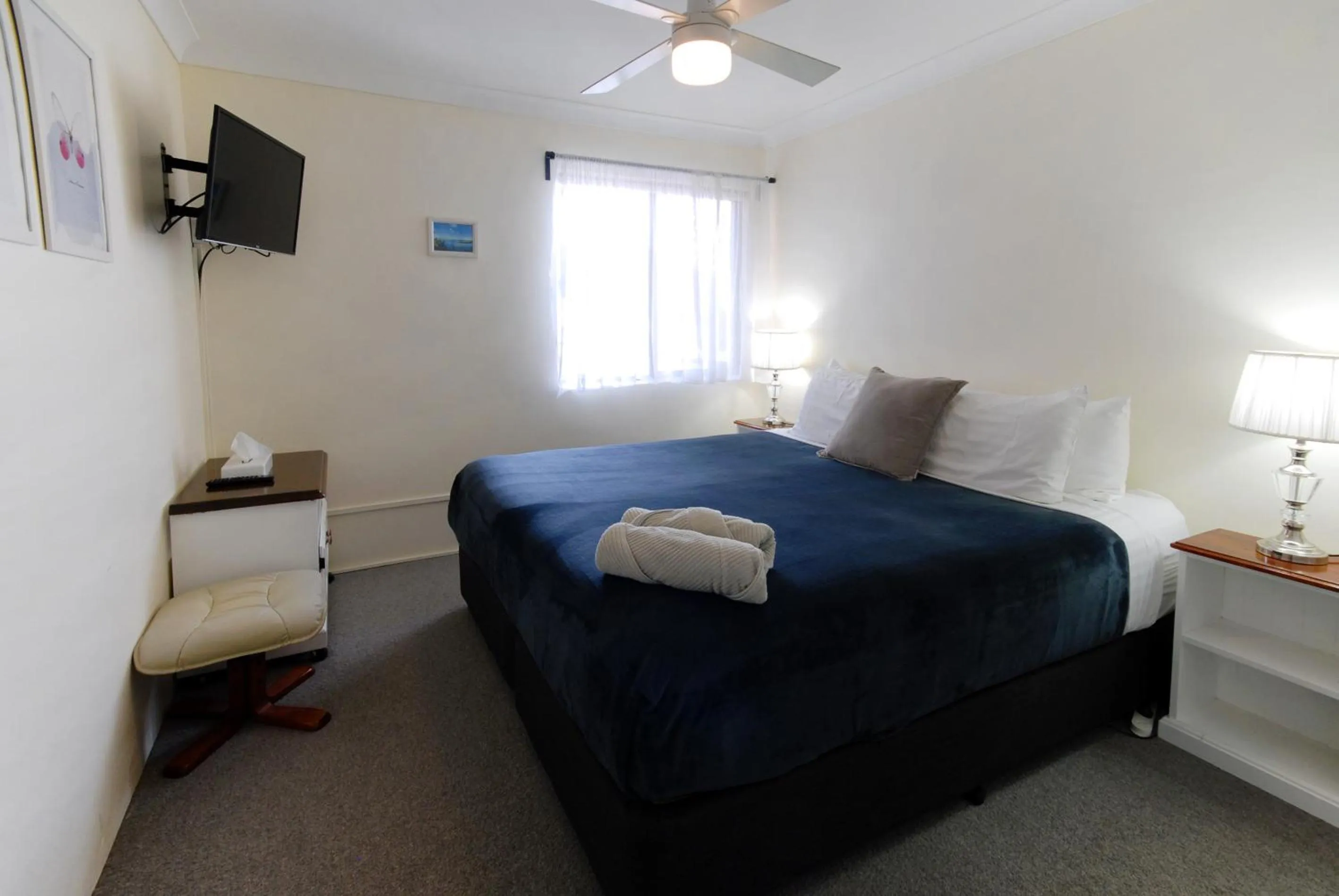 Bed in Marcel Towers Holiday Apartments