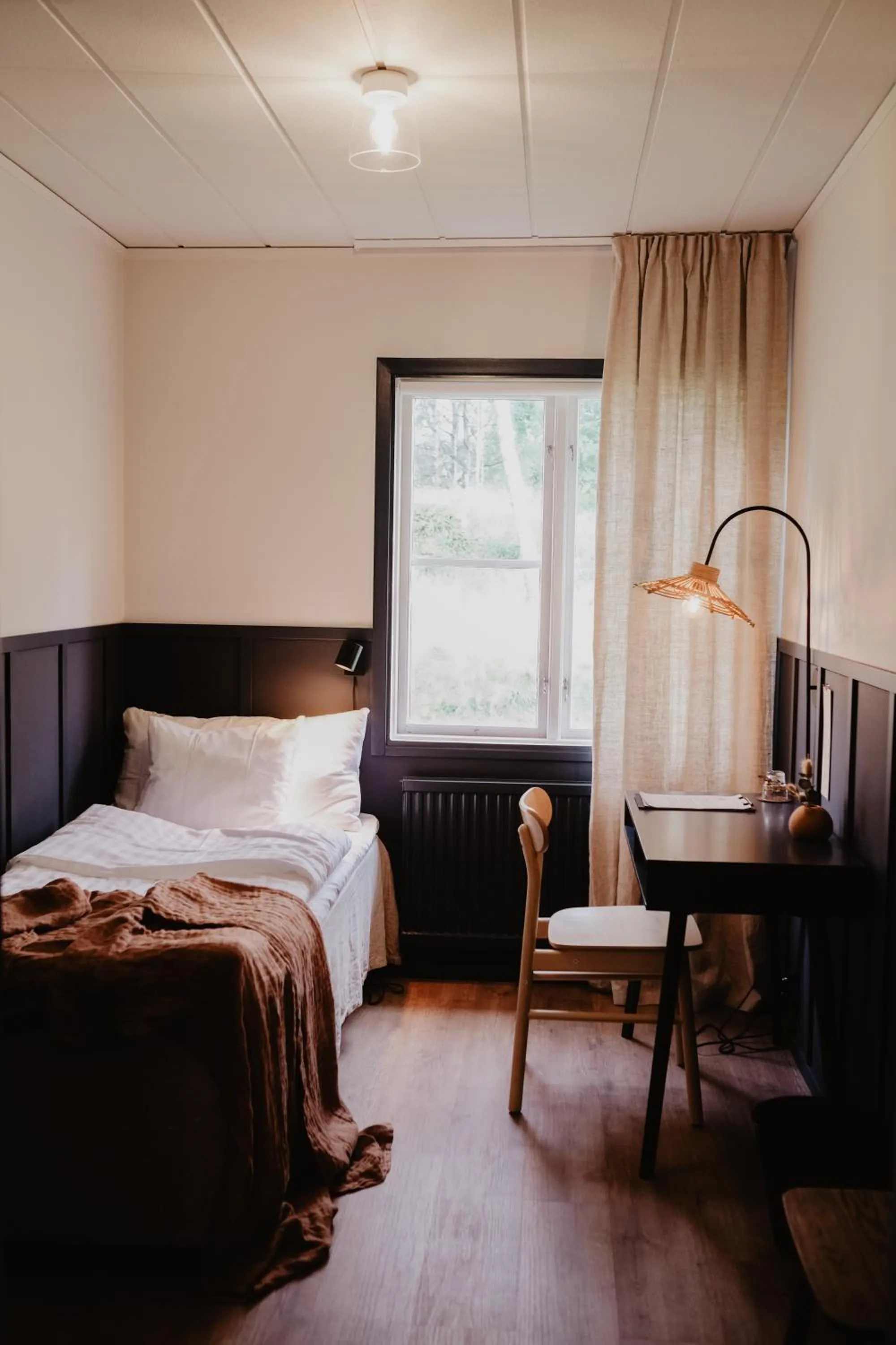 Photo of the whole room, Bed in Stiftsgården Tallnäs