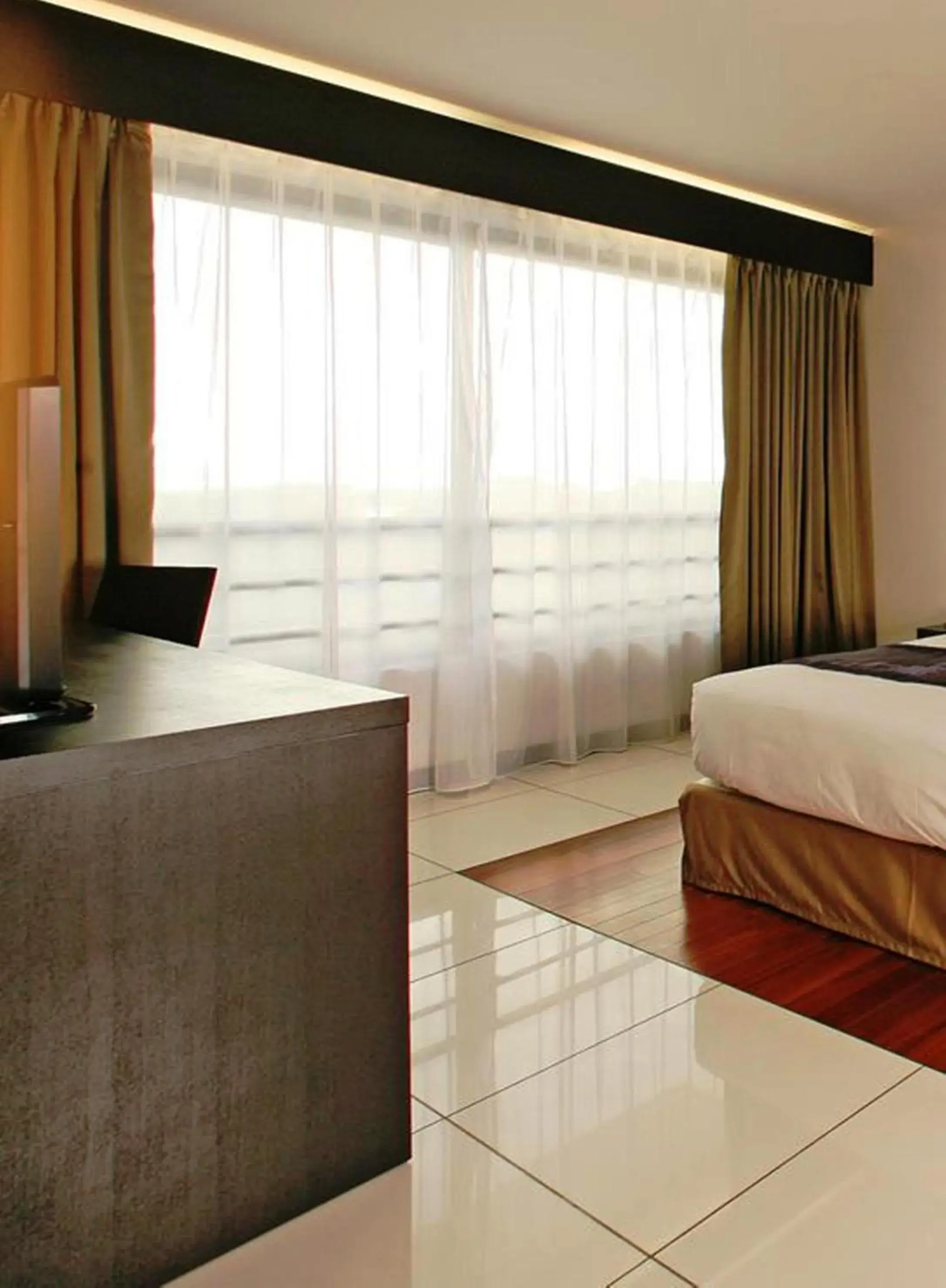 Seating area, Bed in Hotel Tahiti Nui Seating area, Bed in Hotel Tahiti Nui