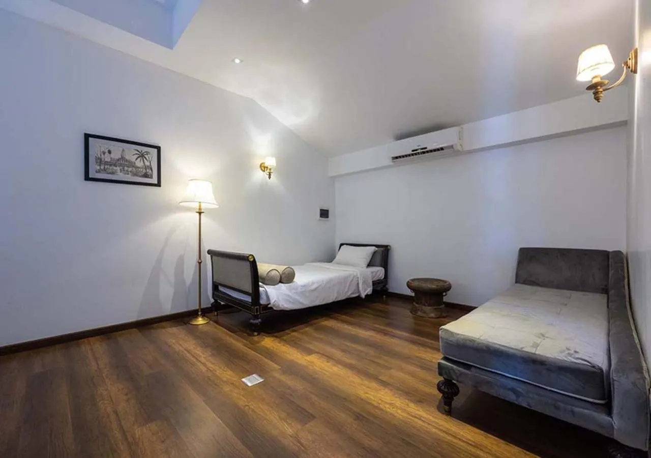 Living room, Bed in Le Thatluang D'oR Boutique Hotel