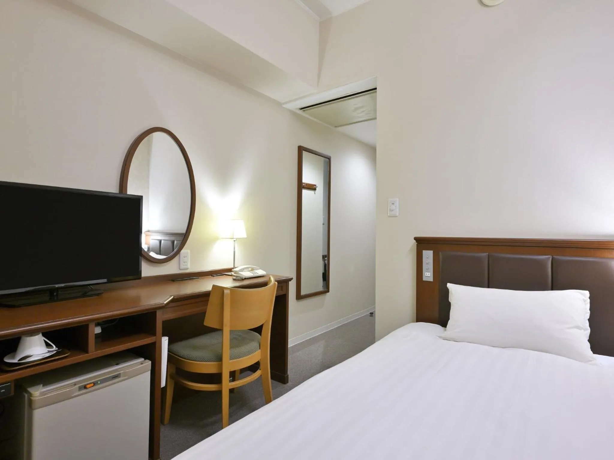 Bed in Rihga Hotel Zest Takamatsu