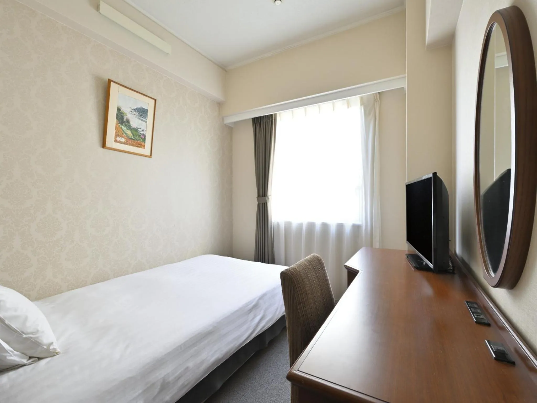 Bed in Rihga Hotel Zest Takamatsu