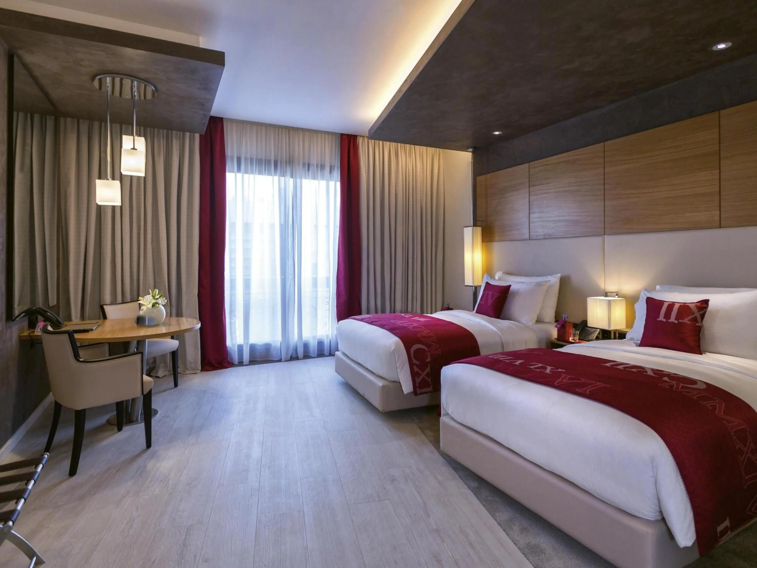 Bedroom, Bed in Mövenpick Hotel du Lac Tunis