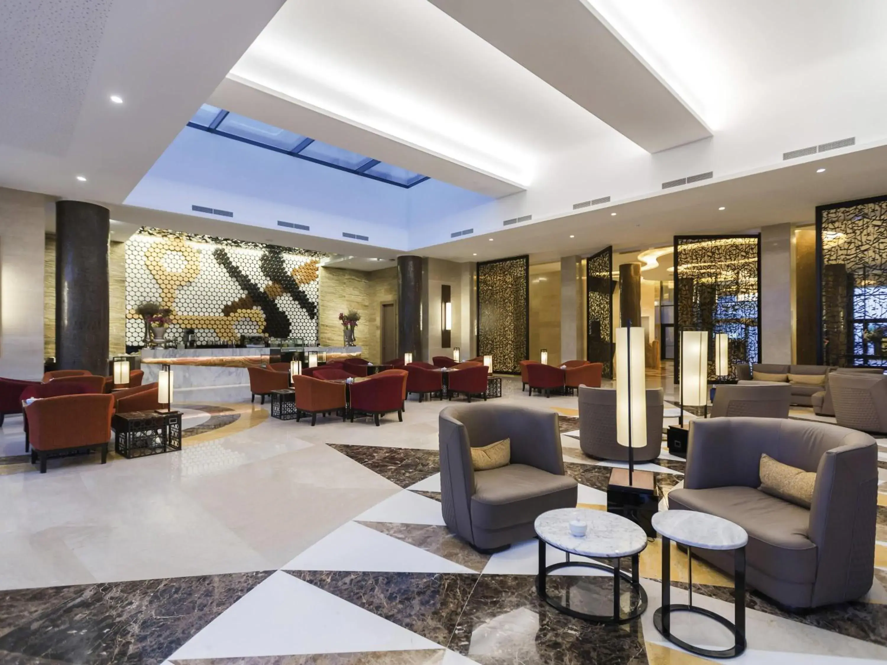 Lounge or bar in Mövenpick Hotel du Lac Tunis Lounge or bar in Mövenpick Hotel du Lac Tunis