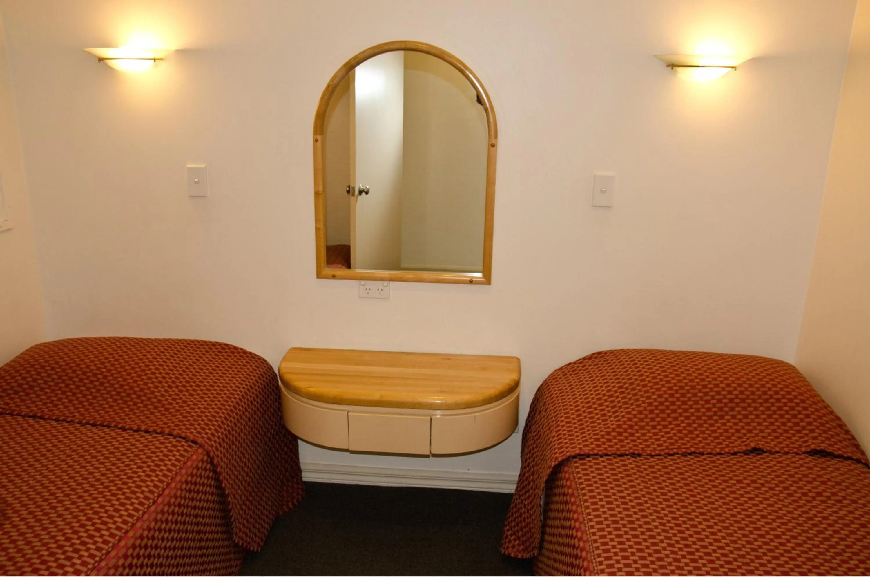 Bed in Beachfront Motel