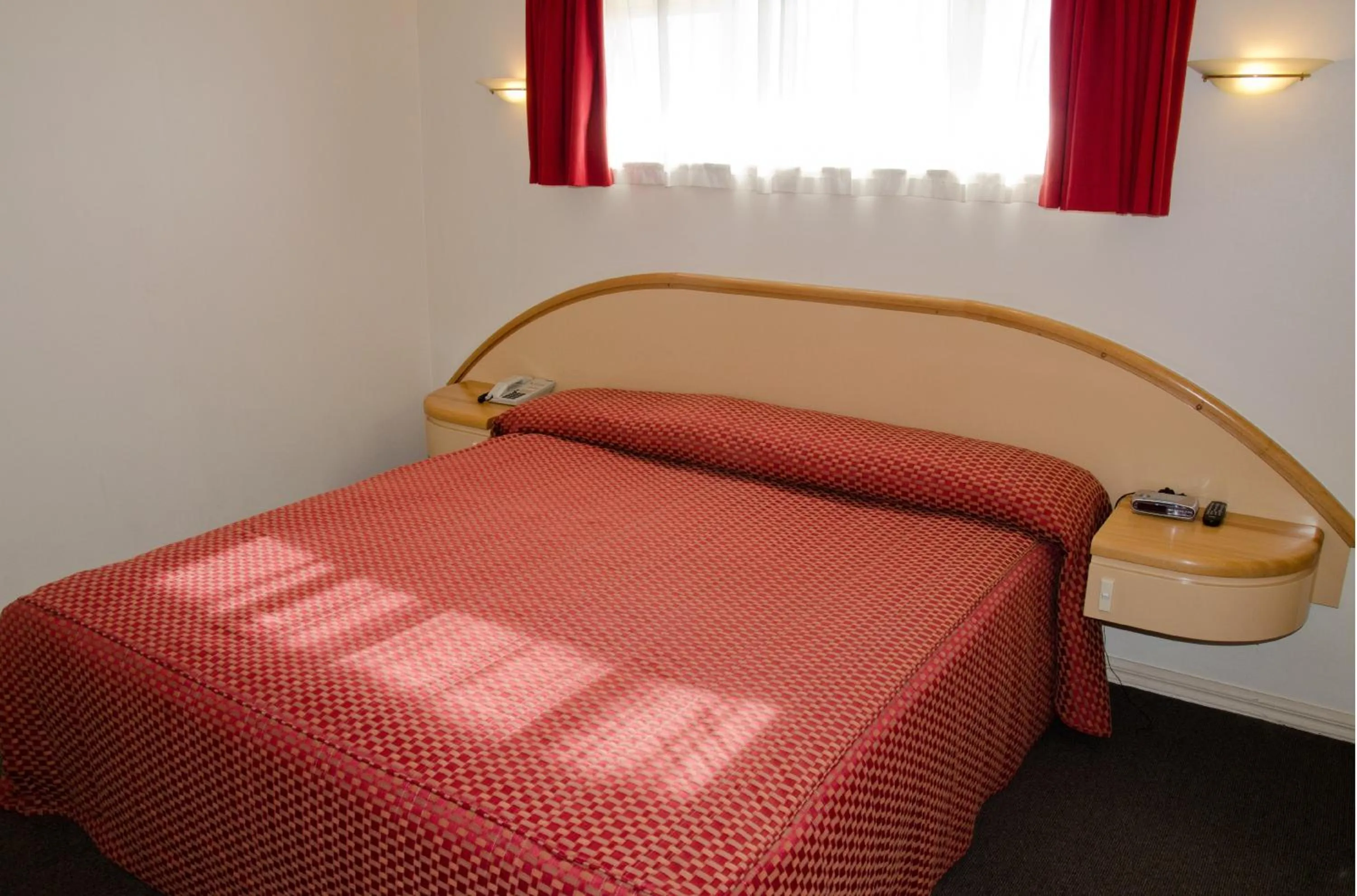 Bed in Beachfront Motel