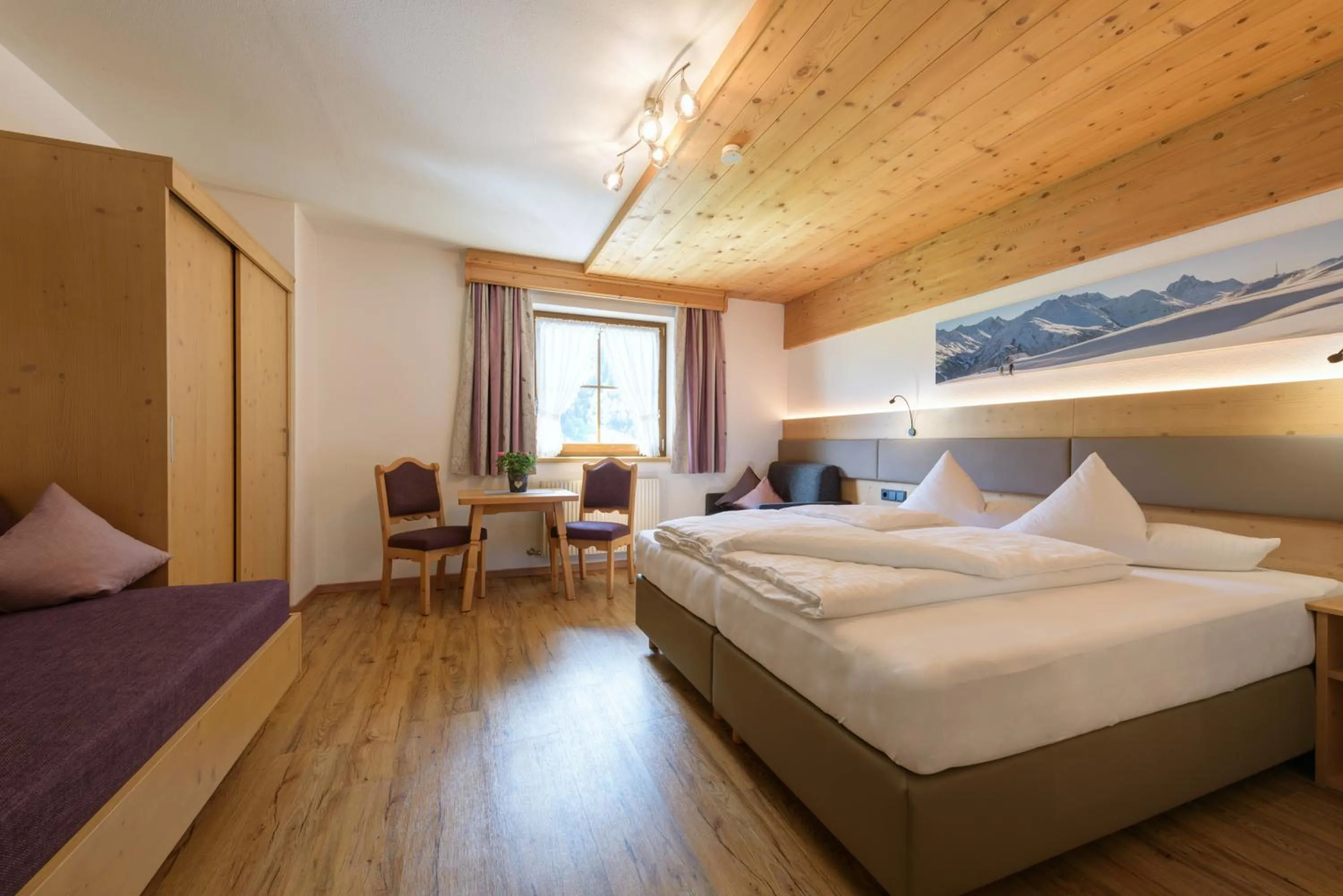 Photo of the whole room, Bed in Landhaus Strolz