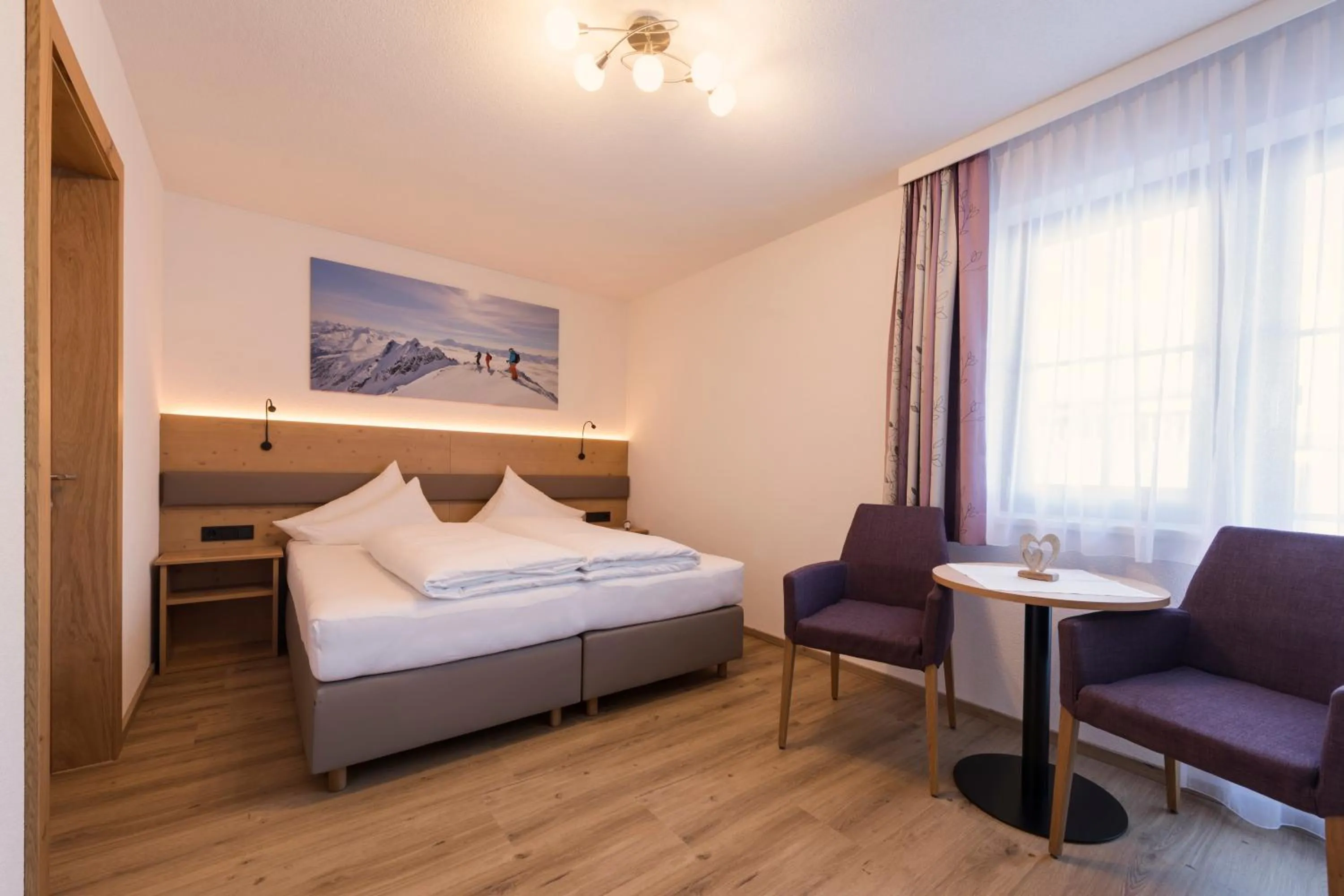 Photo of the whole room, Bed in Landhaus Strolz