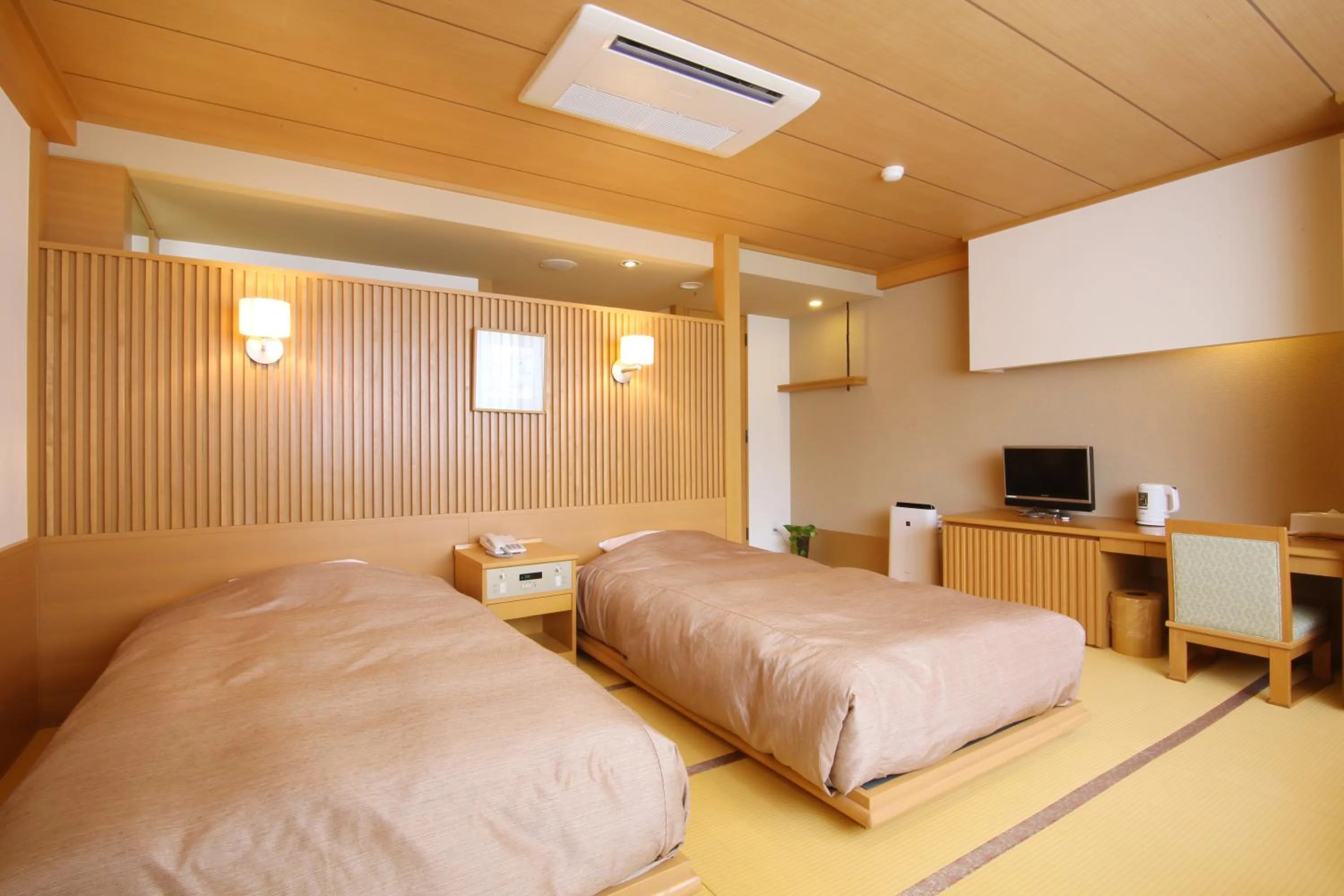 Living room, Bed in Shiretoko Daiichi Hotel