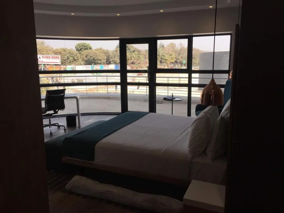 Balcony/Terrace, Bed in Garden Court Kitwe