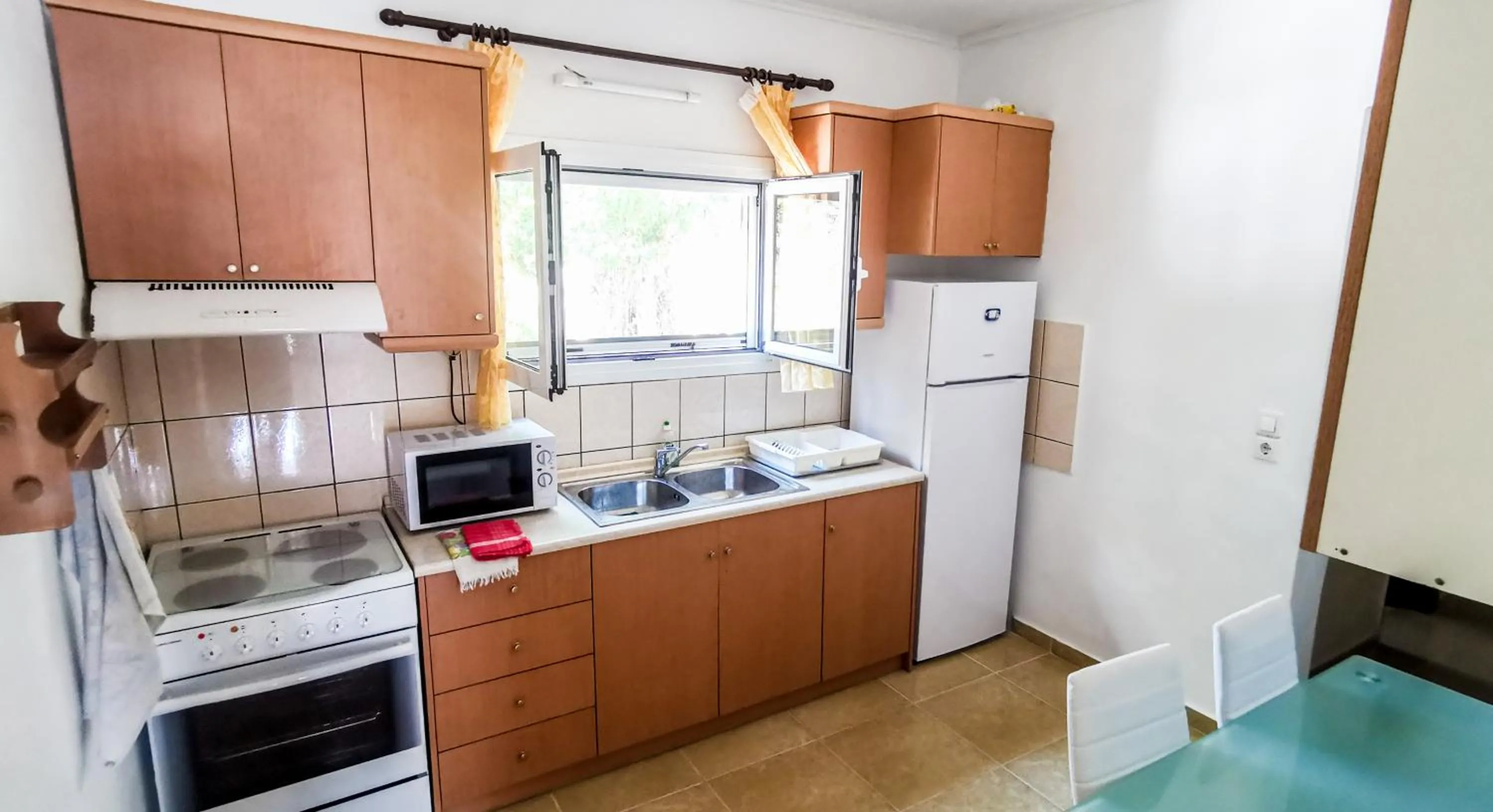 Kitchen or kitchenette in Villa Panorea