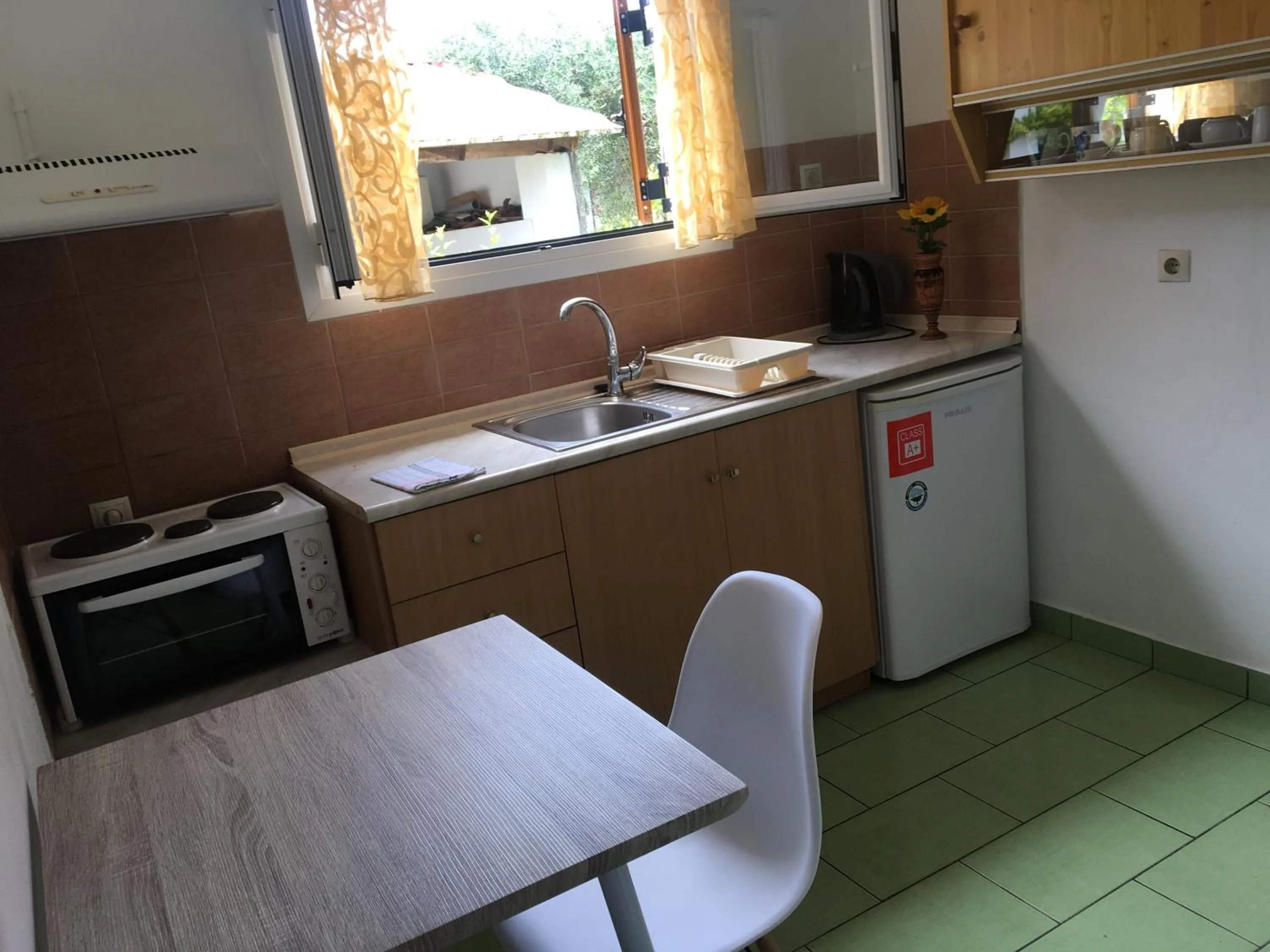 Kitchen or kitchenette in Villa Panorea