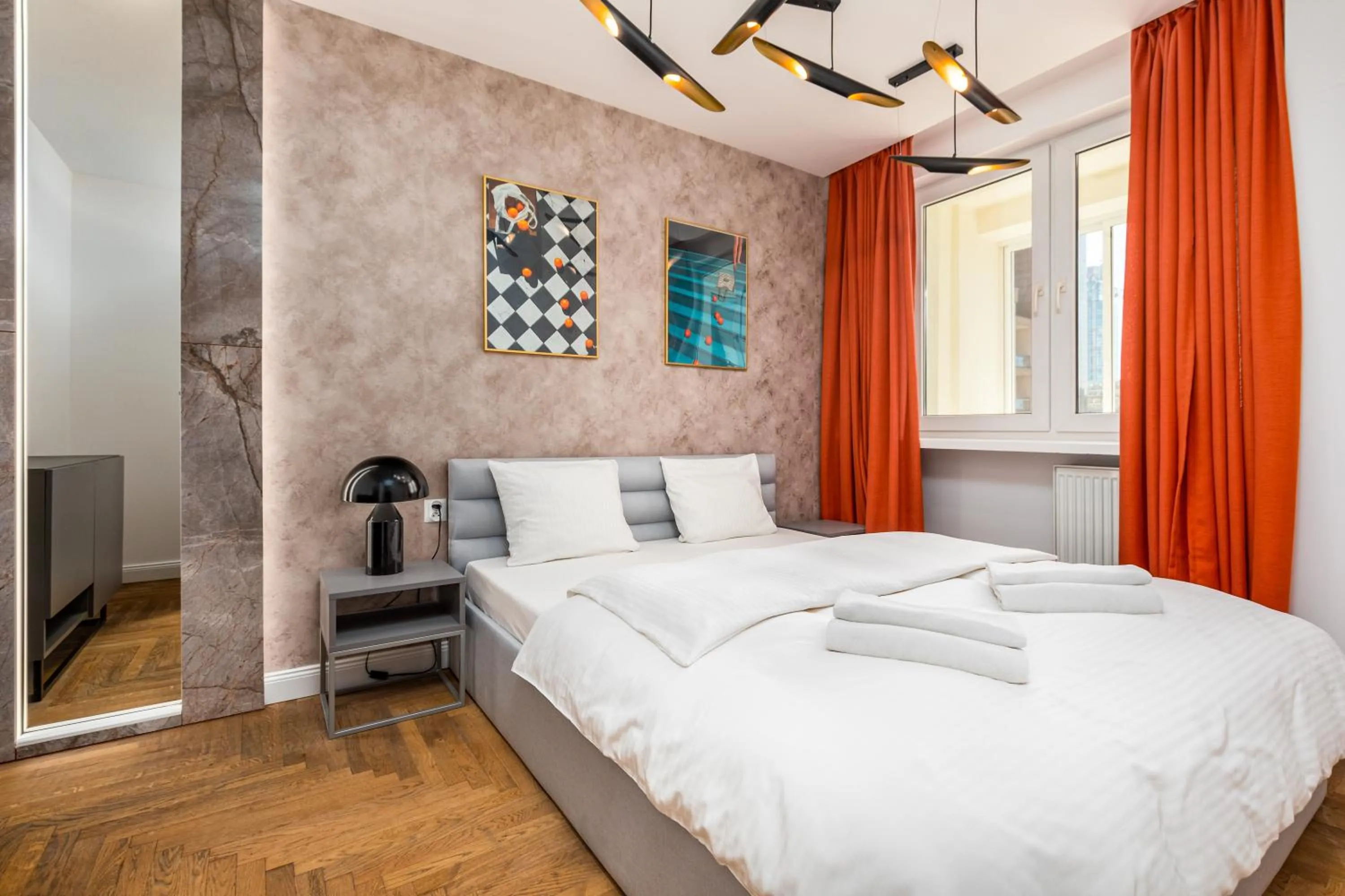 Bed in Apartament Moniuszki by Your Freedom