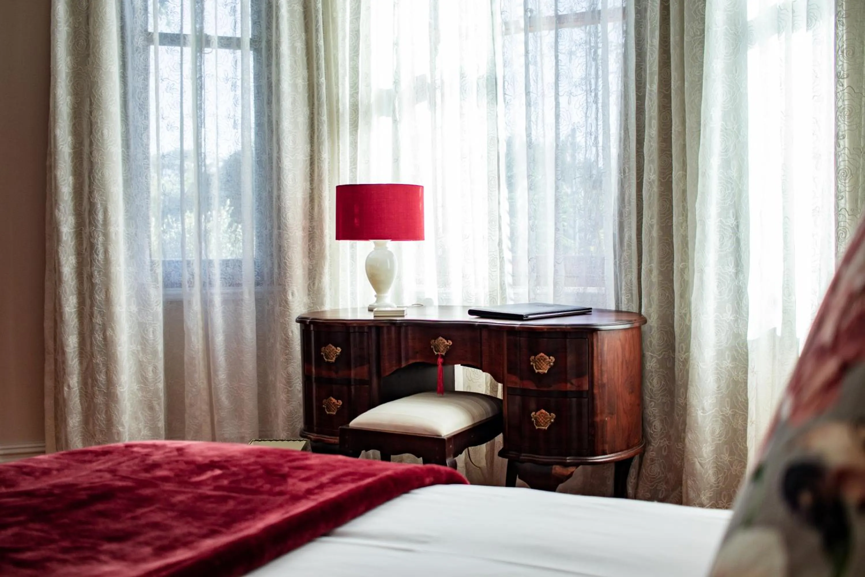 Bed in Carmichael House Boutique Hotel