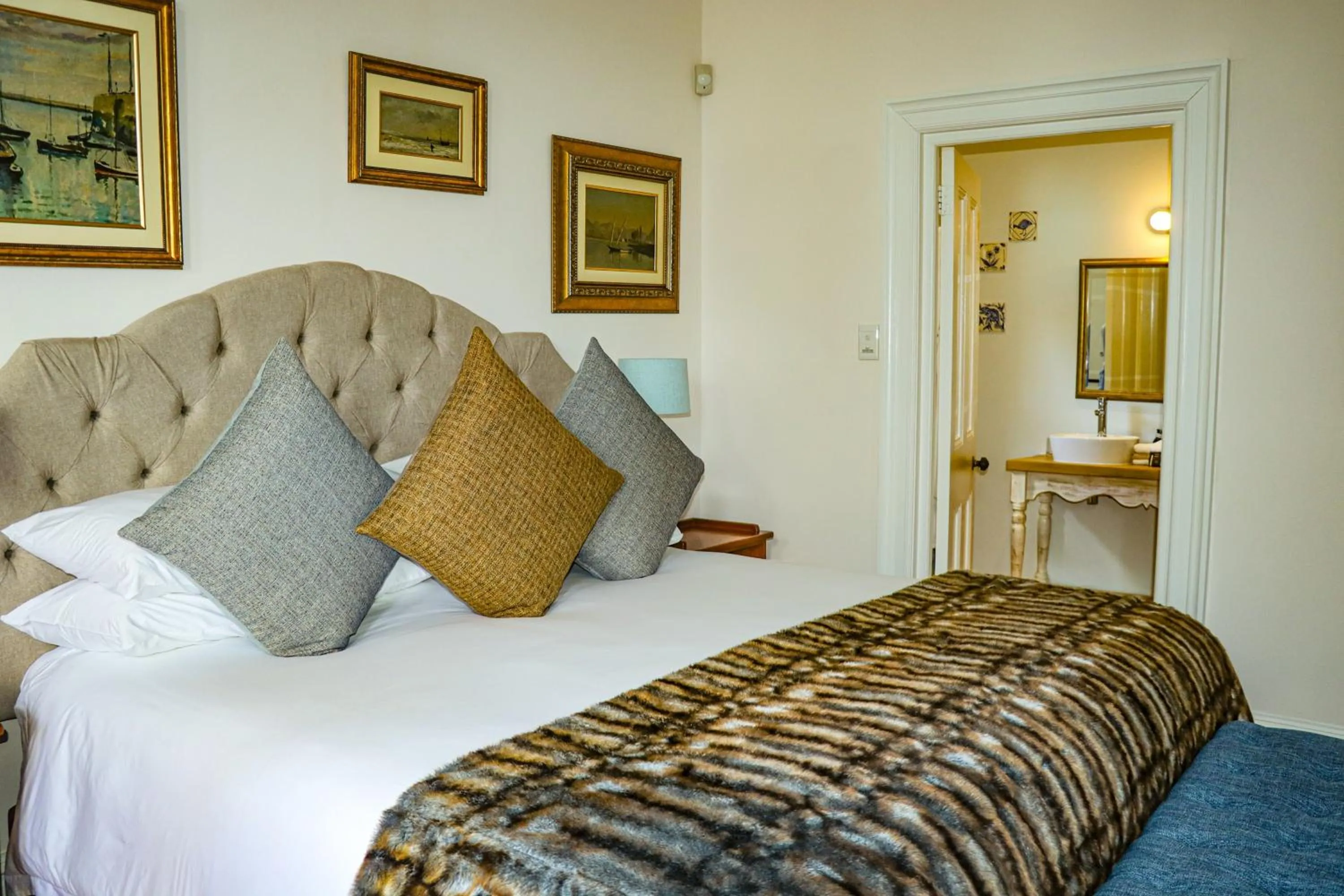 Bed in Carmichael House Boutique Hotel