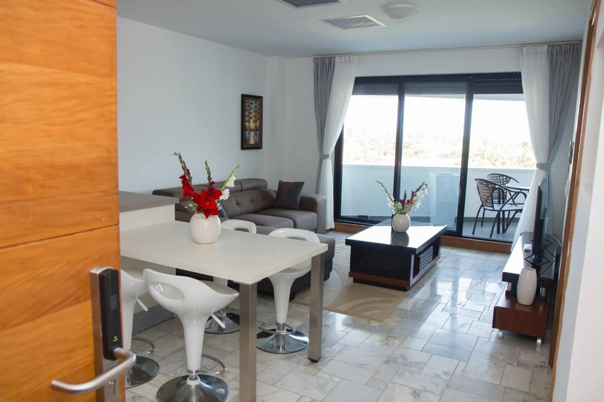 Living room in The Streamliner Hotel Apartment