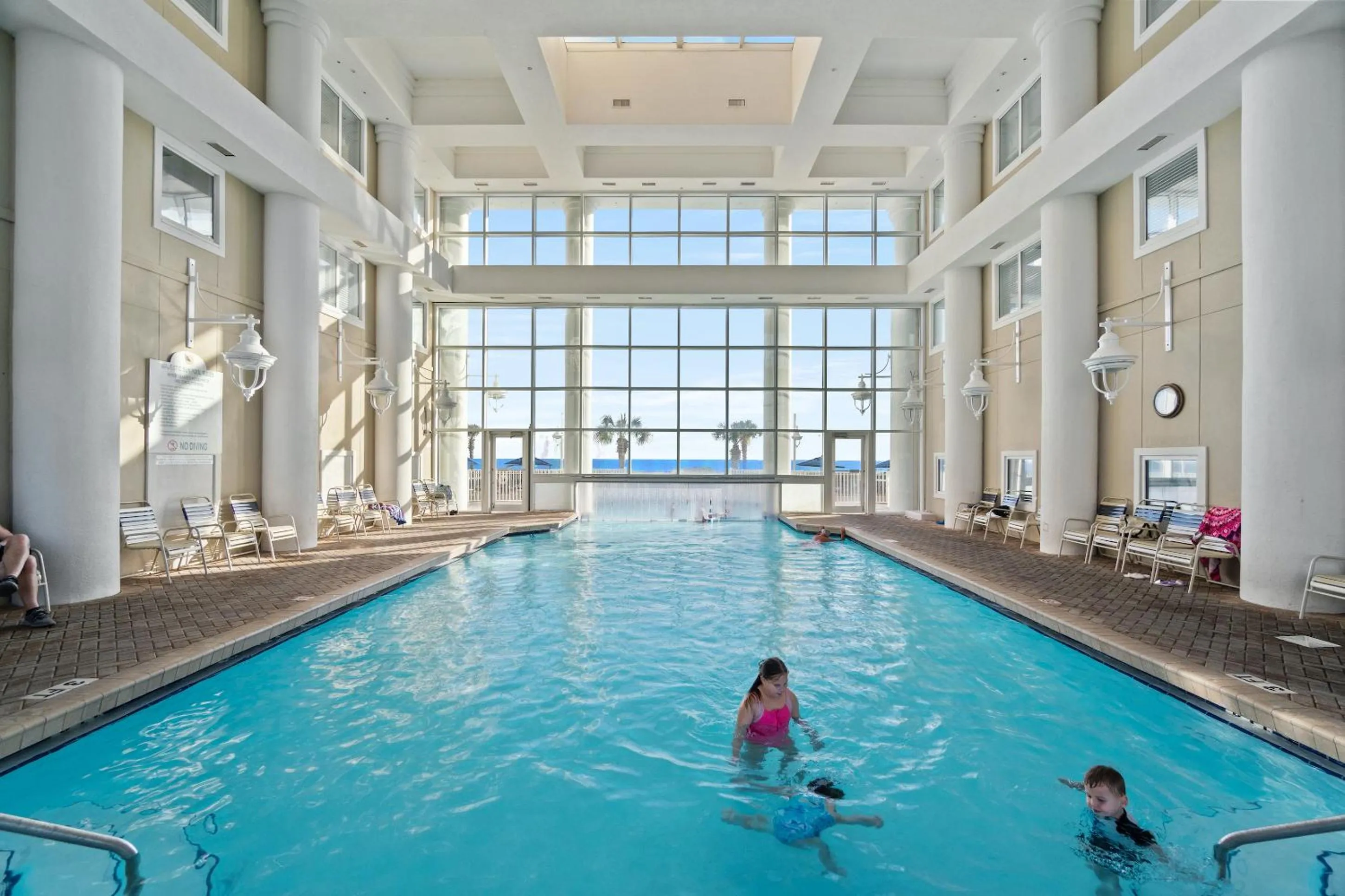 People in Majestic Sun Beach Resort by Panhandle Getaways