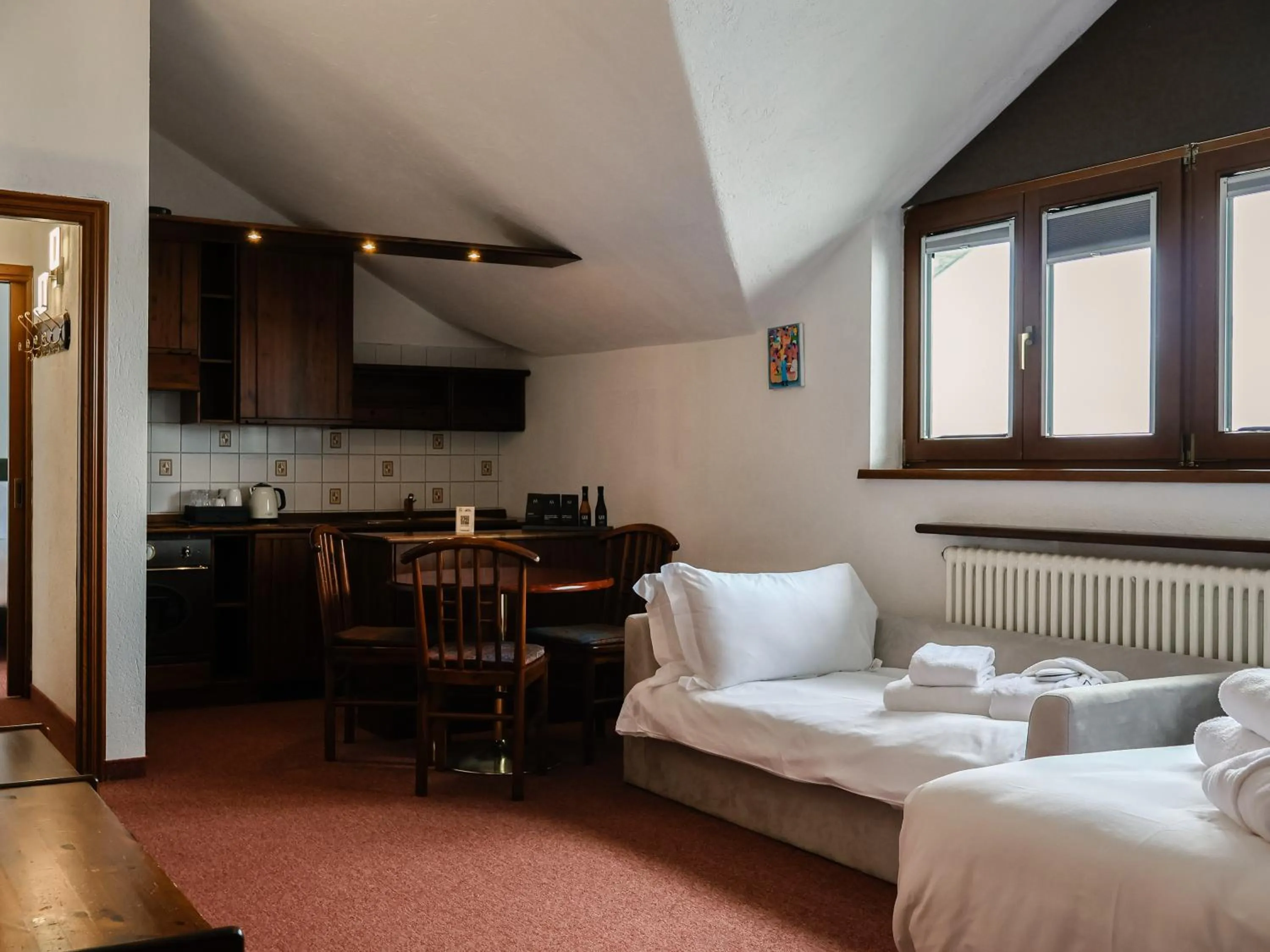 Living room, Bed in Hotel Europa