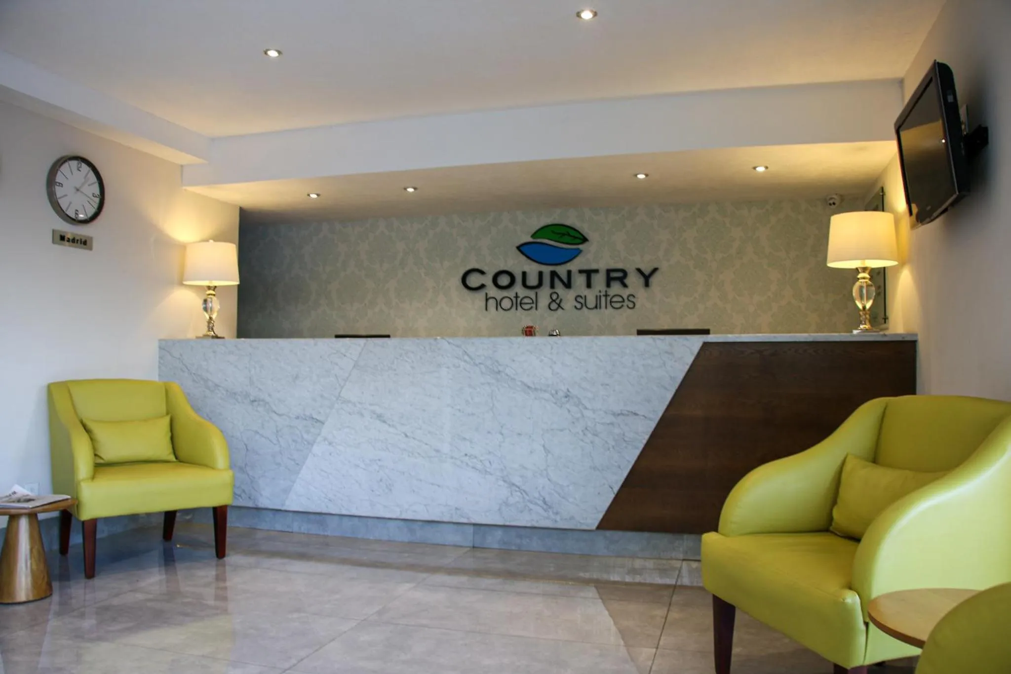 Lobby or reception in Country Hotel & Suites