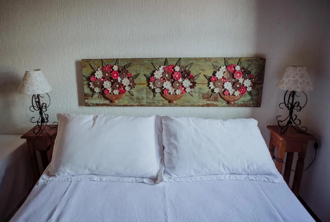 Bed in Hospedaria de Alice