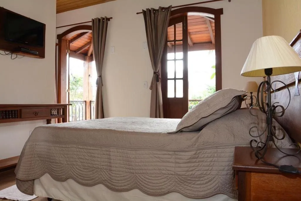 Bed in Hospedaria de Alice