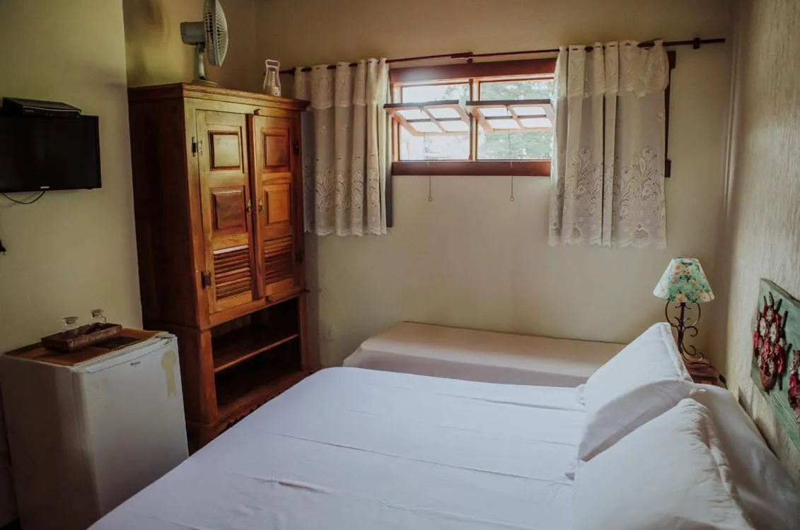 Bed in Hospedaria de Alice