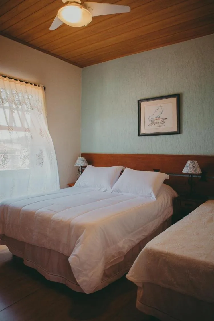 Bed in Hospedaria de Alice