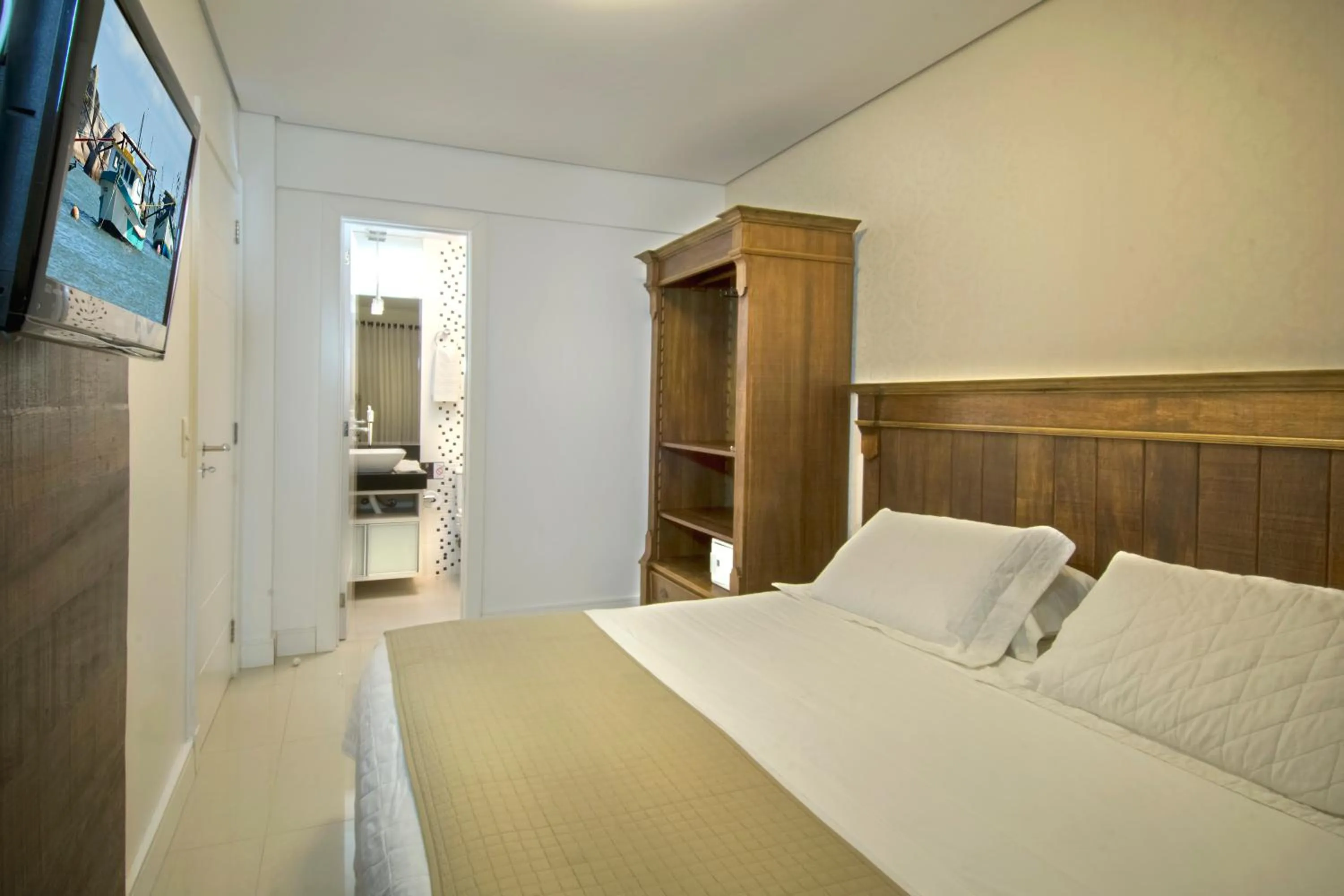 Bed in Pousada Bora Bora