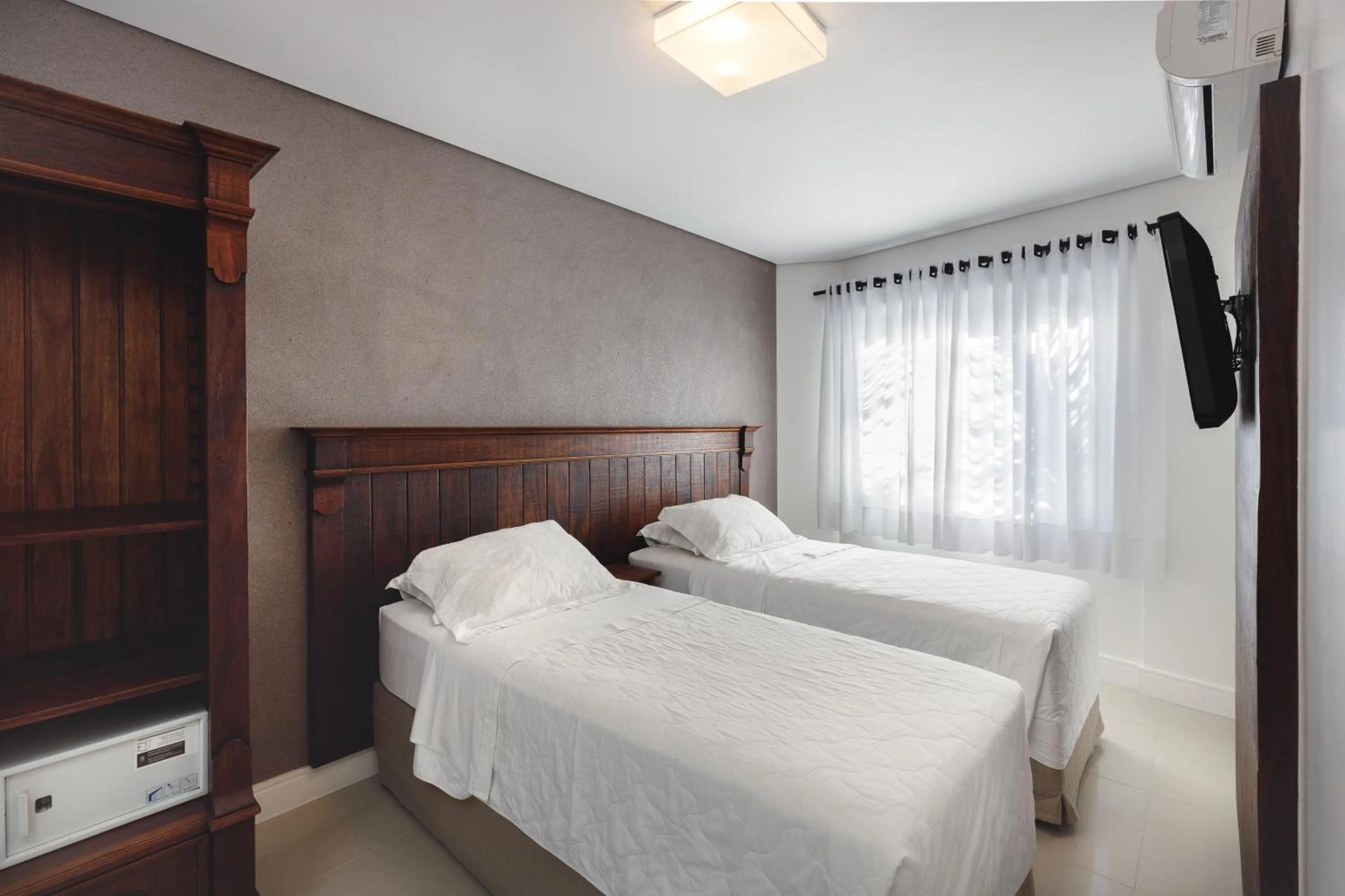 Bed in Pousada Bora Bora