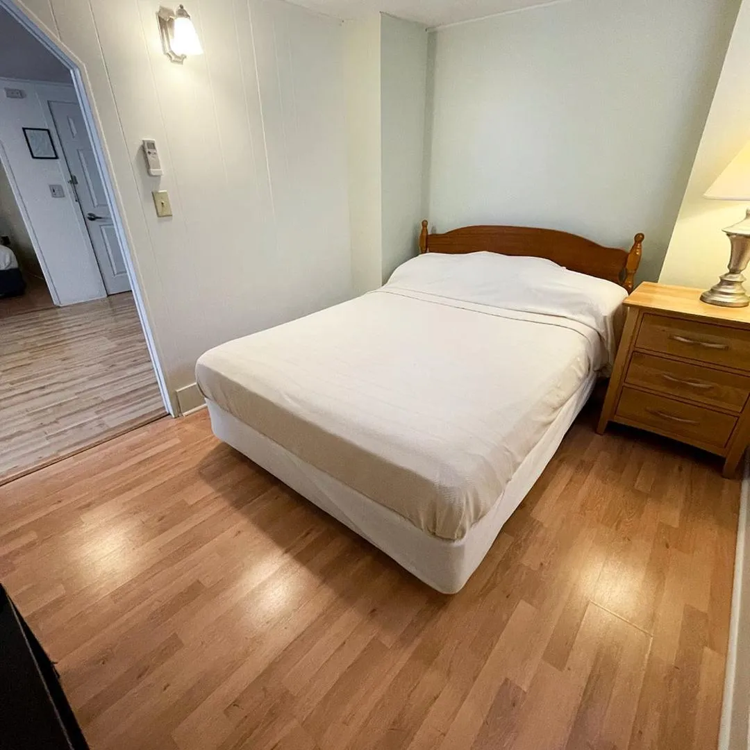 Bed in Baseball Town Motel