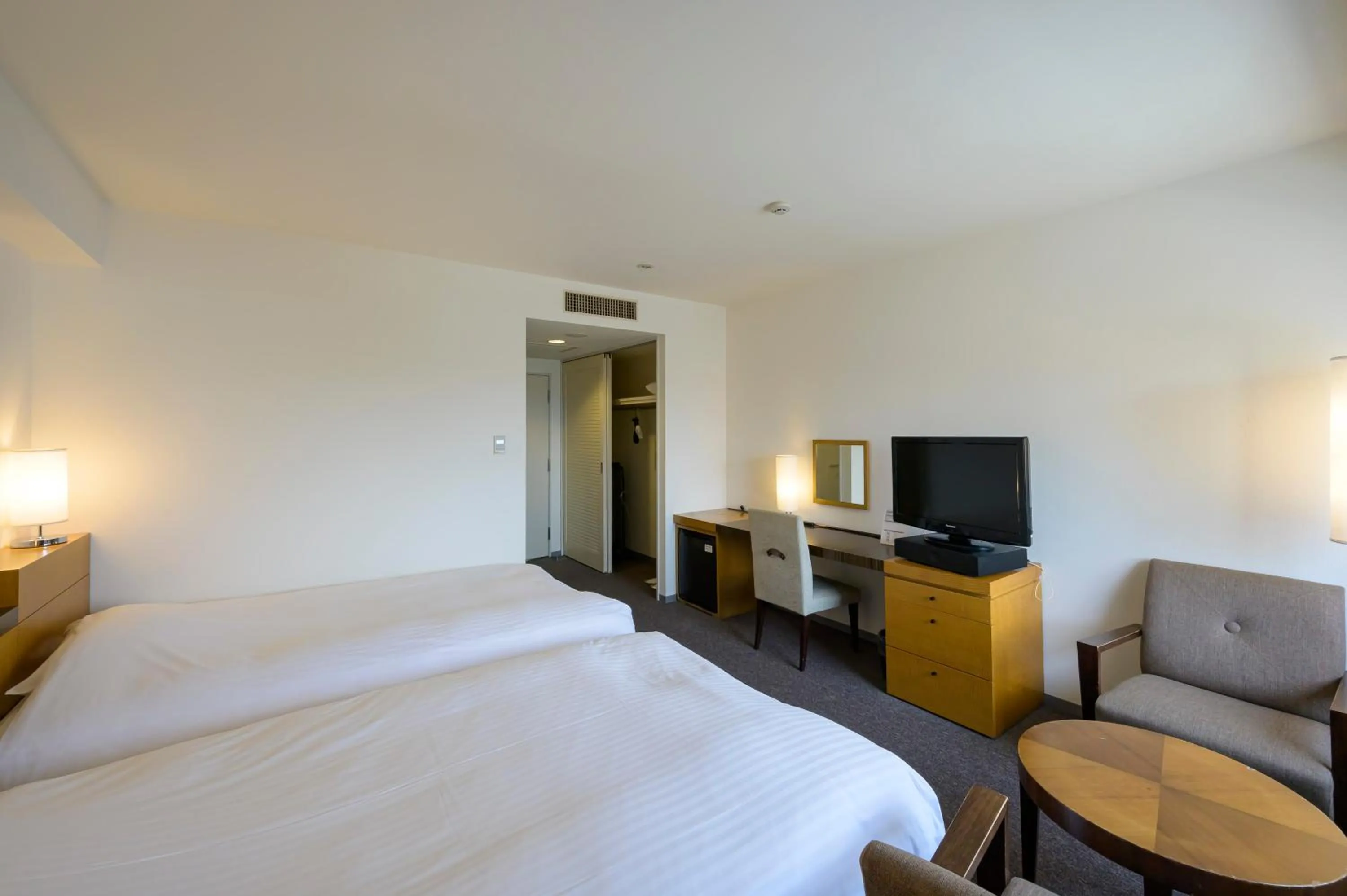 Bed in Twin Leaves Hotel Izumo