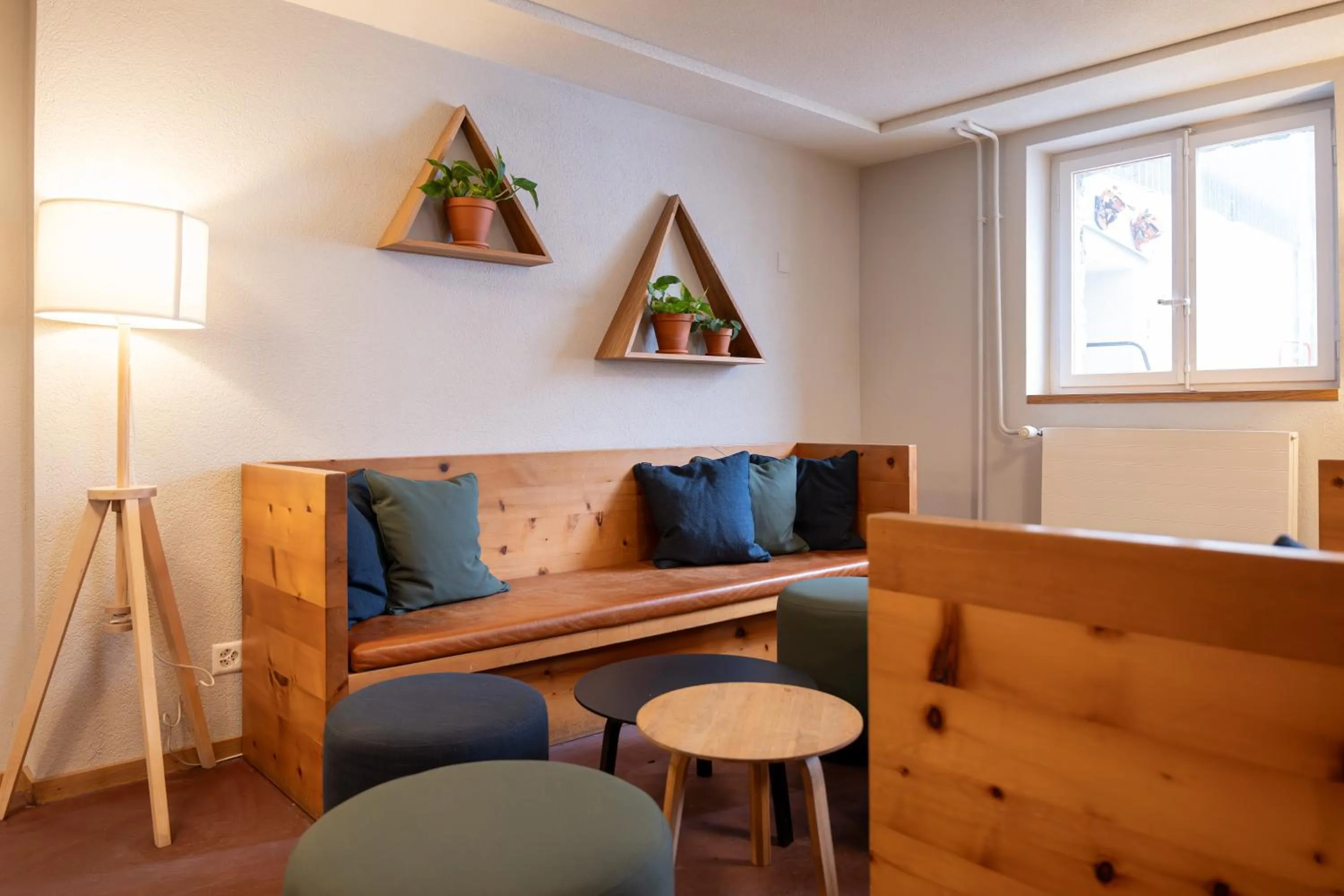 Communal lounge/ TV room in Zermatt Youth Hostel