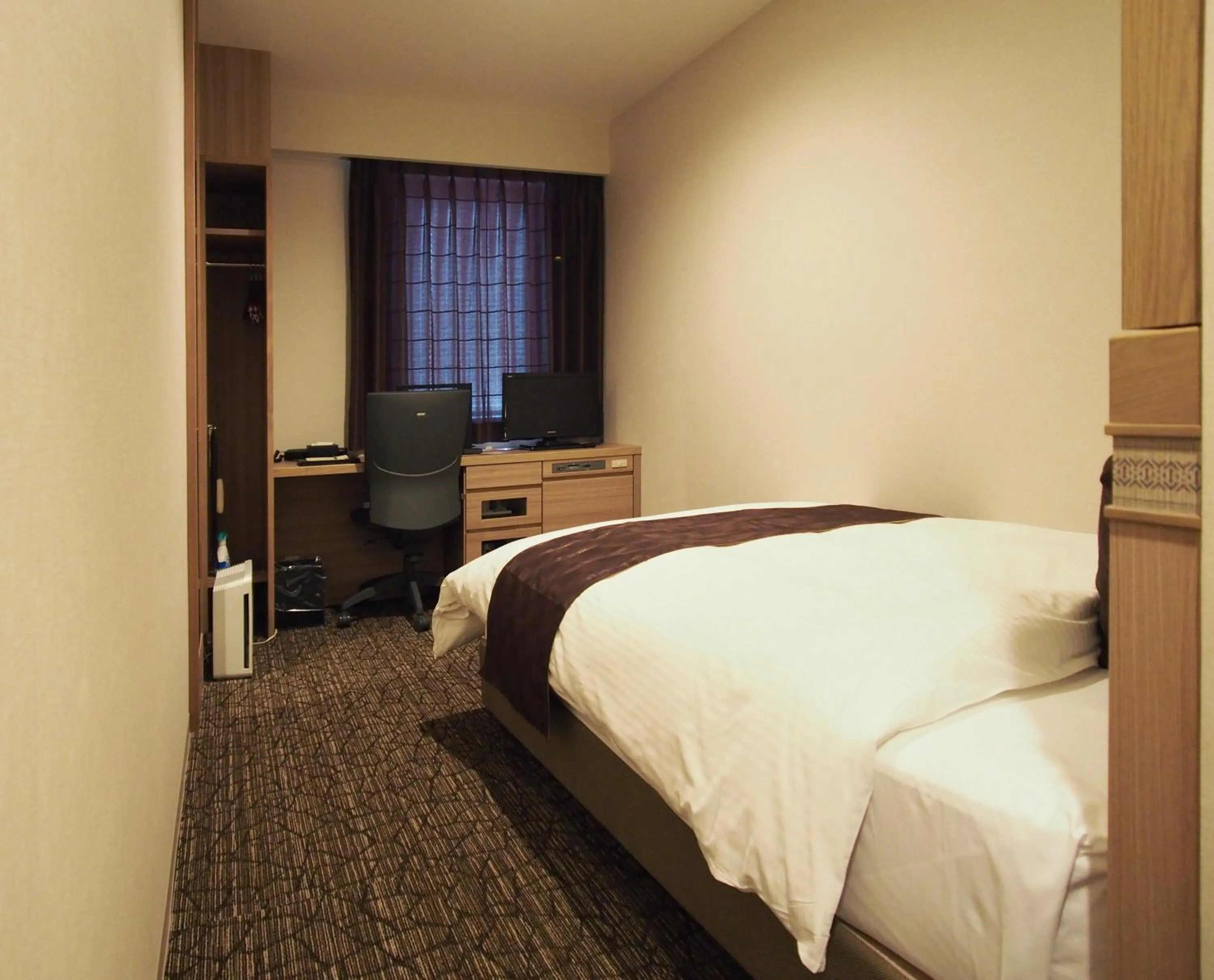 Bed in Hotel Fukuoka Garden Palace