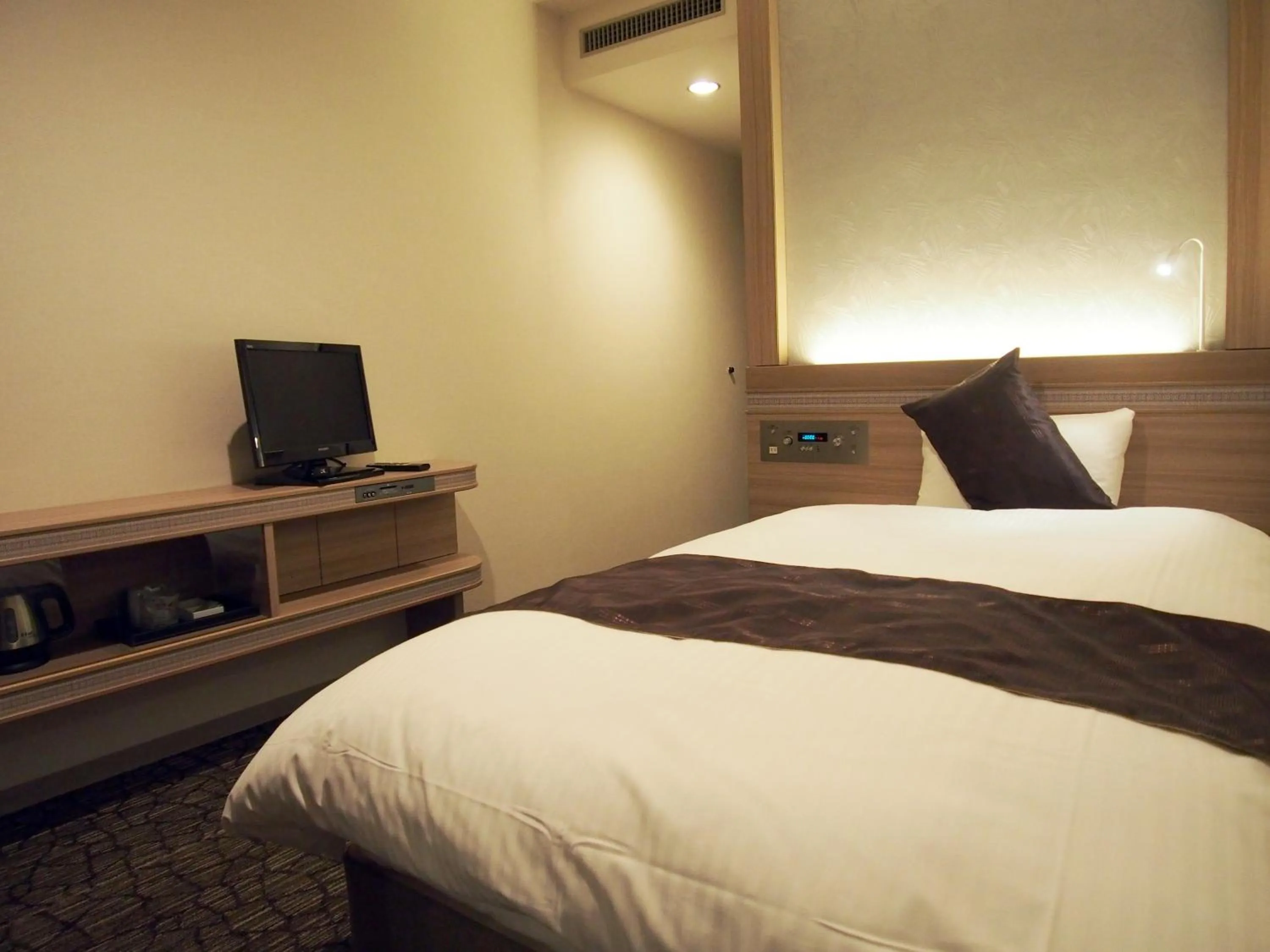 Bed in Hotel Fukuoka Garden Palace