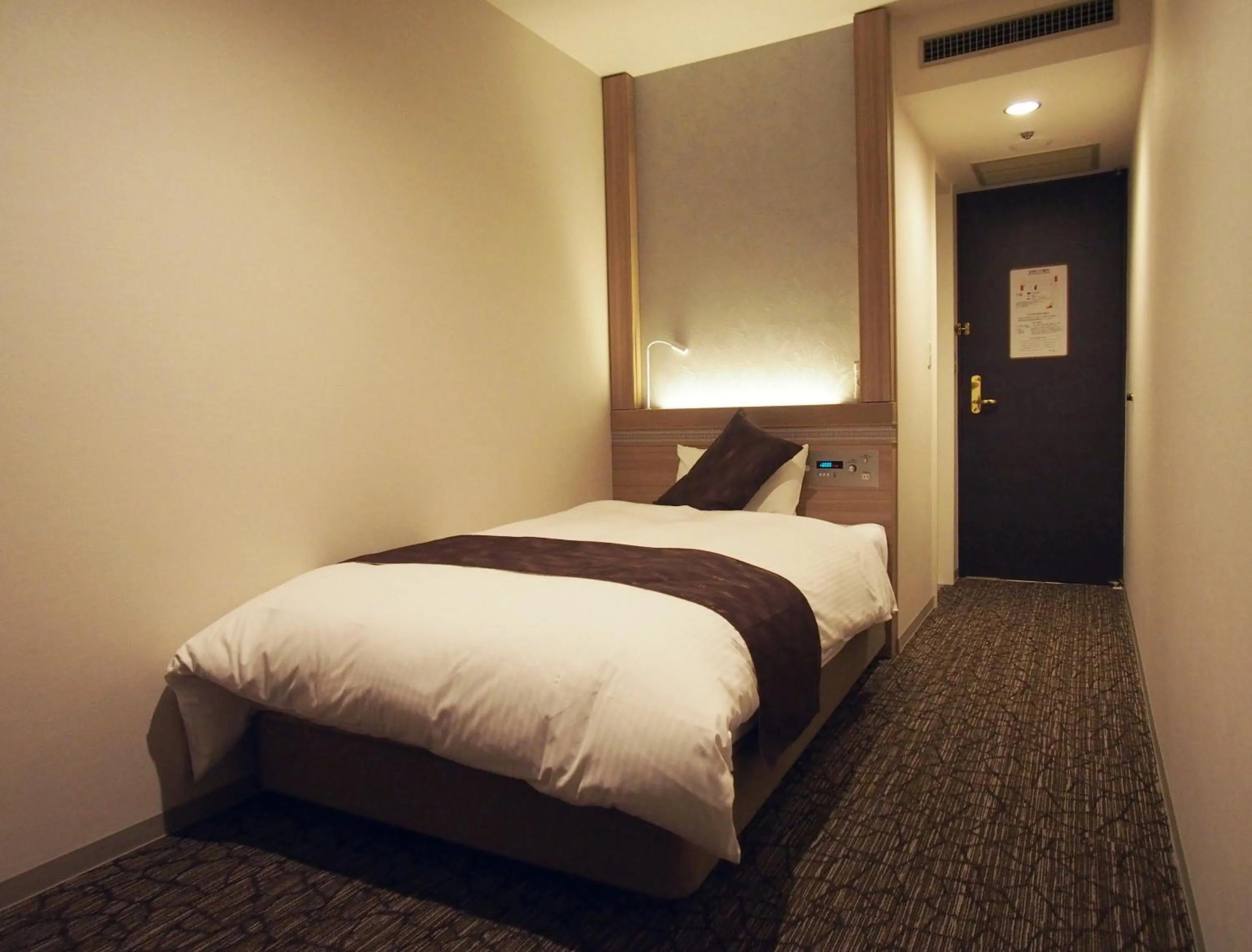 Bed in Hotel Fukuoka Garden Palace