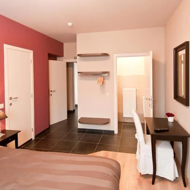 Seating area, Bed in B&B Innbrugas