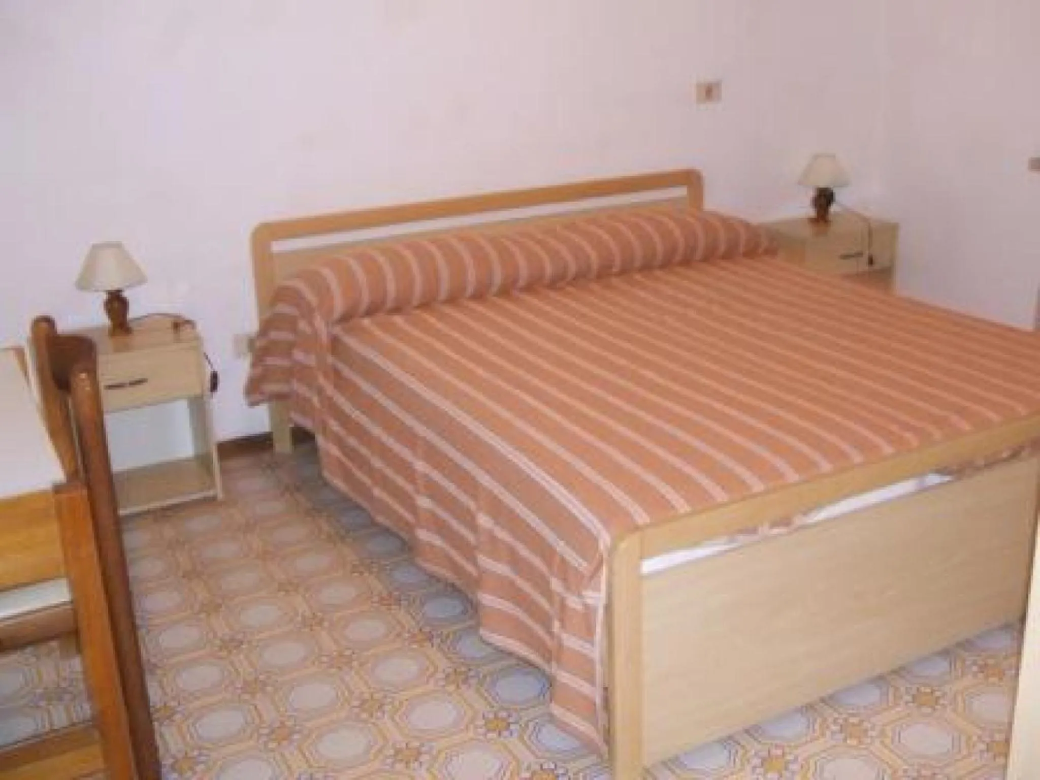 Bed in Giannella Appartamenti