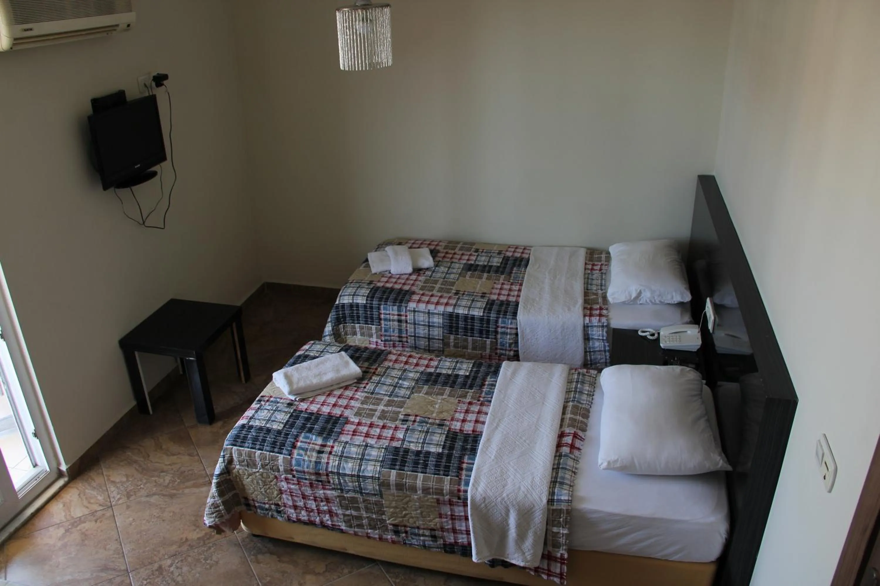 Photo of the whole room, Bed in Le Moral Apart Hotel