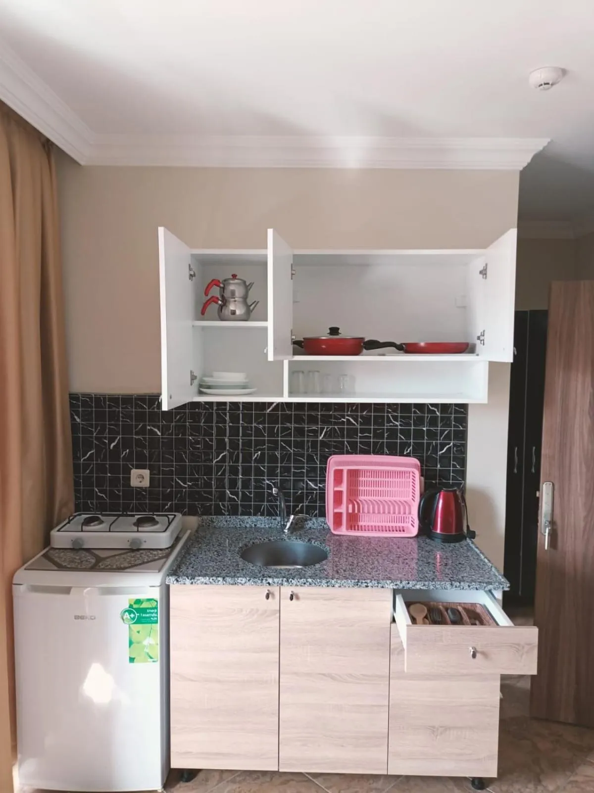 Kitchen or kitchenette in Le Moral Apart Hotel