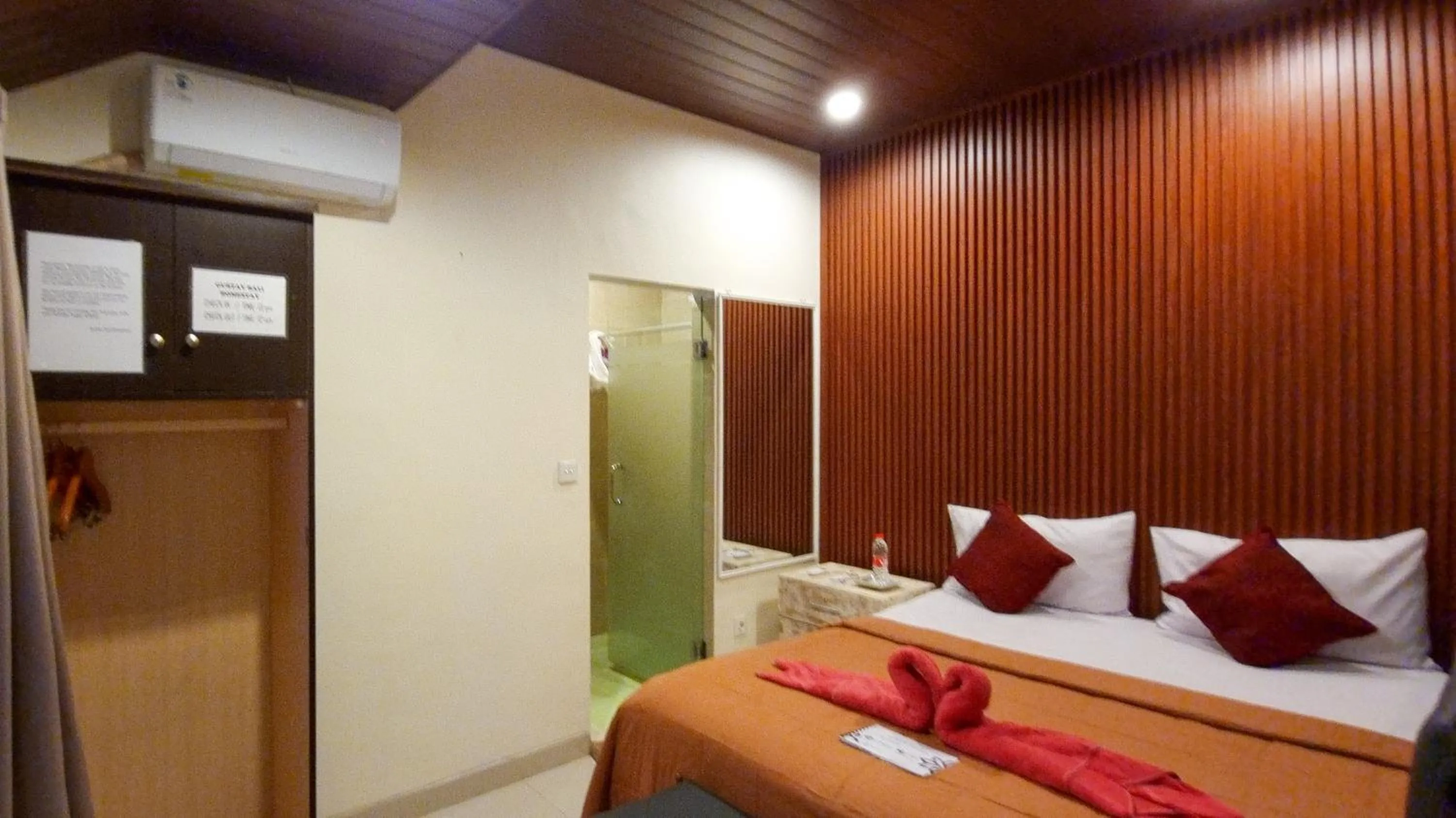 Bed in Gustav Bali Homestay and Massage